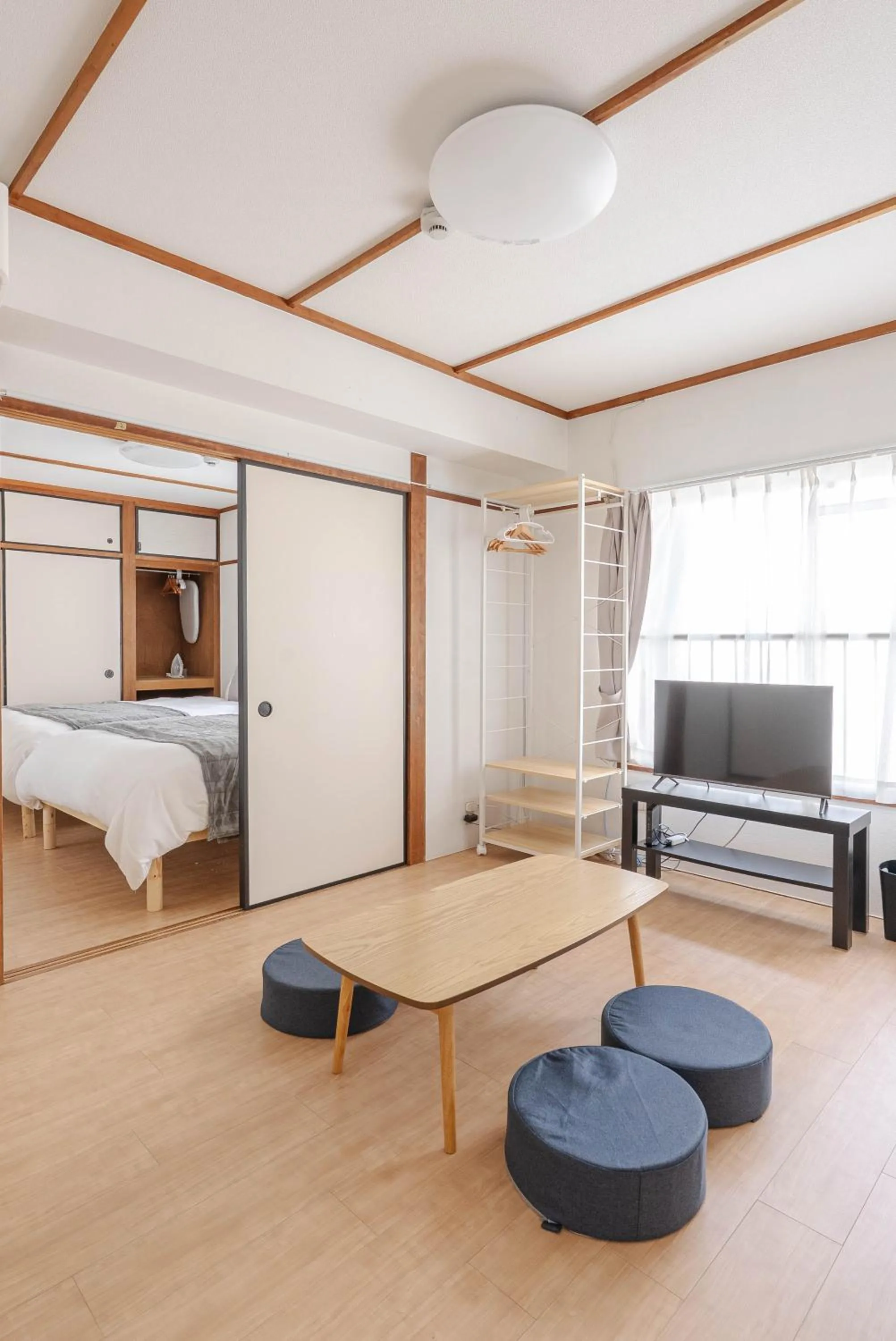 Living room, Bed in Hakata apartment