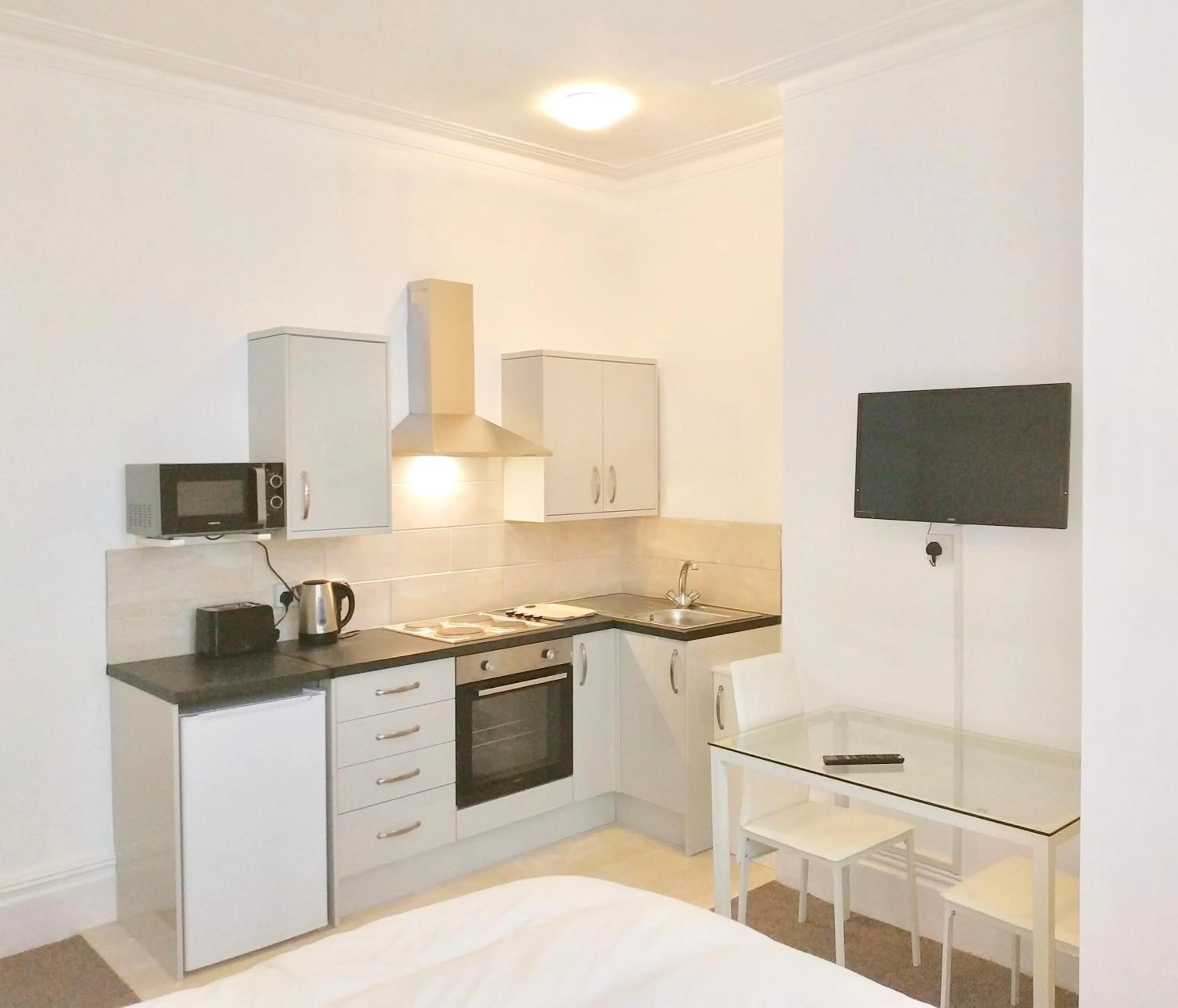 Kitchen or kitchenette in Empress Select Holiday Flats