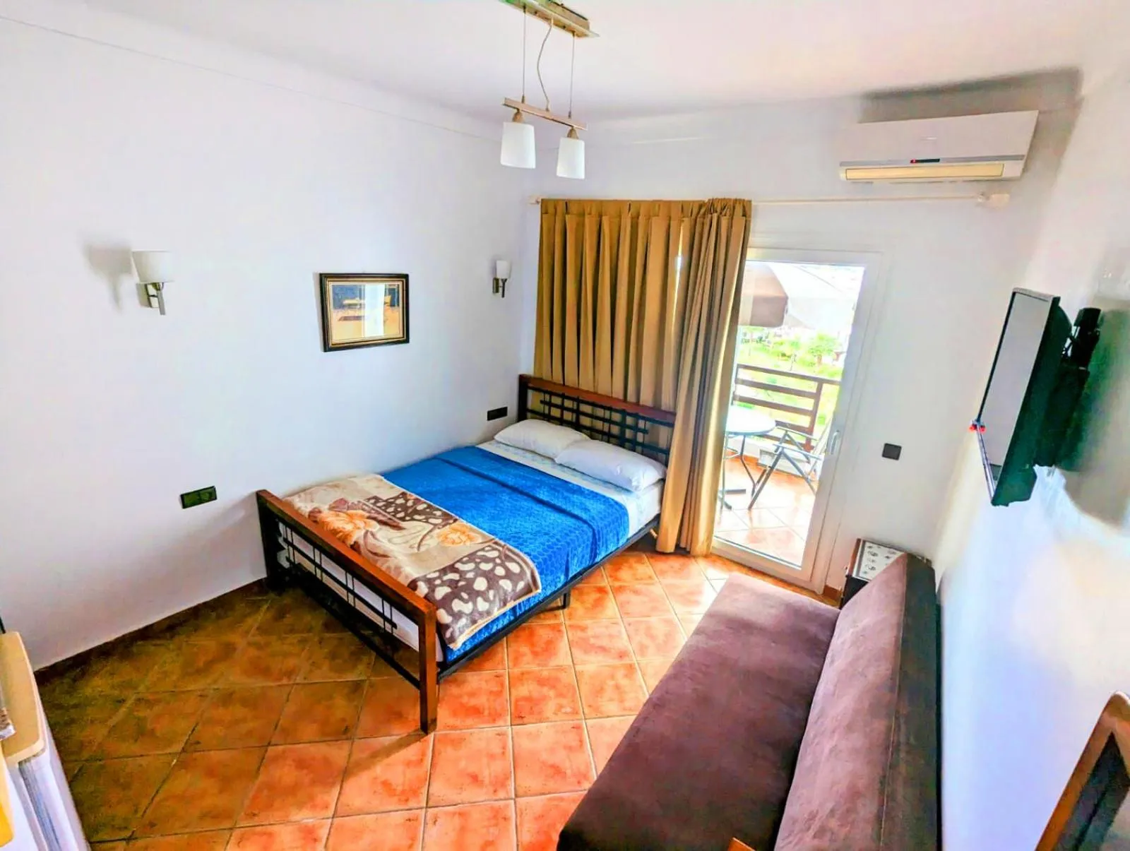 Communal lounge/ TV room, Bed in Mirador Golf Appart-hotel