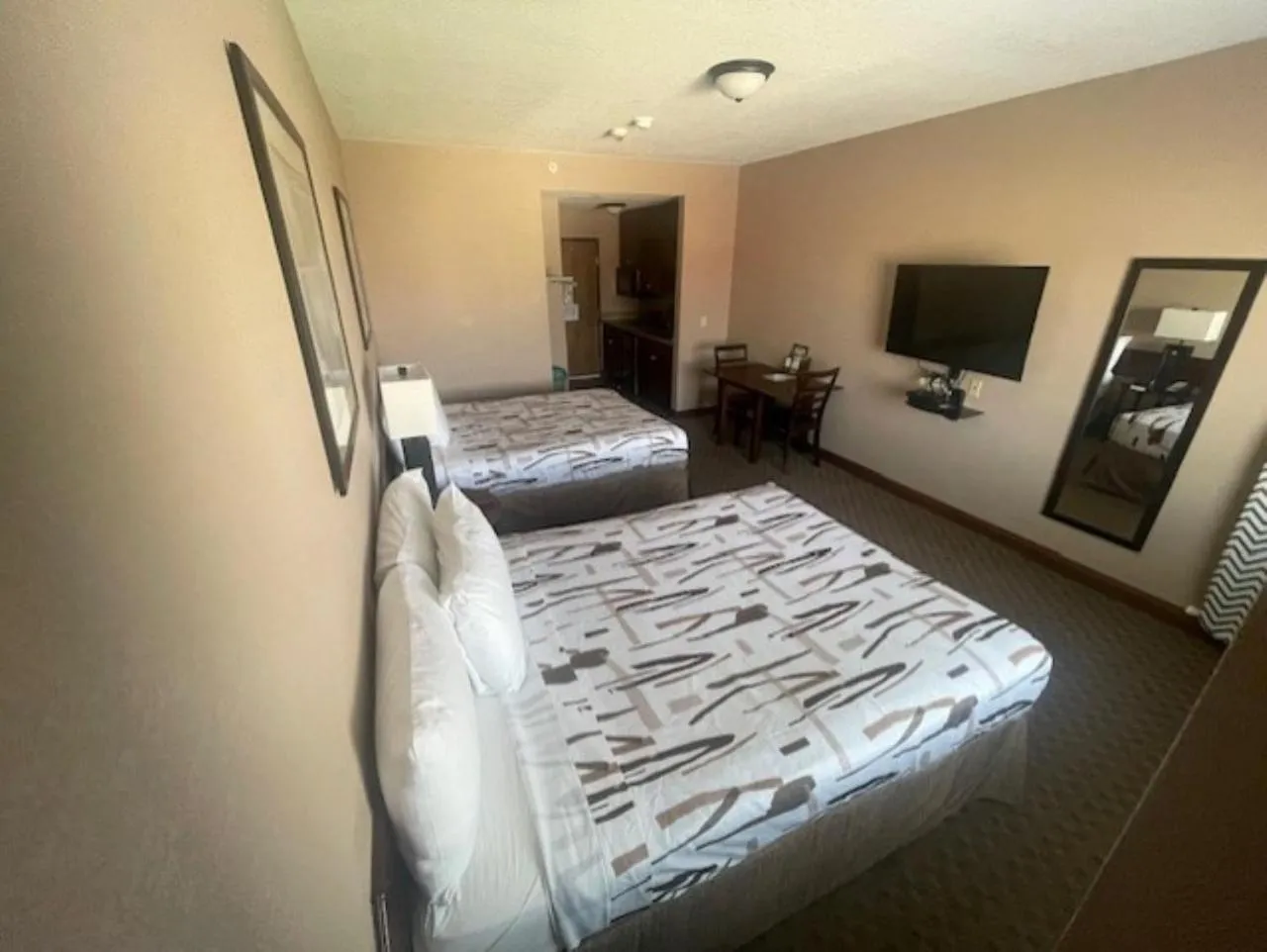 Bed in Bell's Extended Stay and Suites