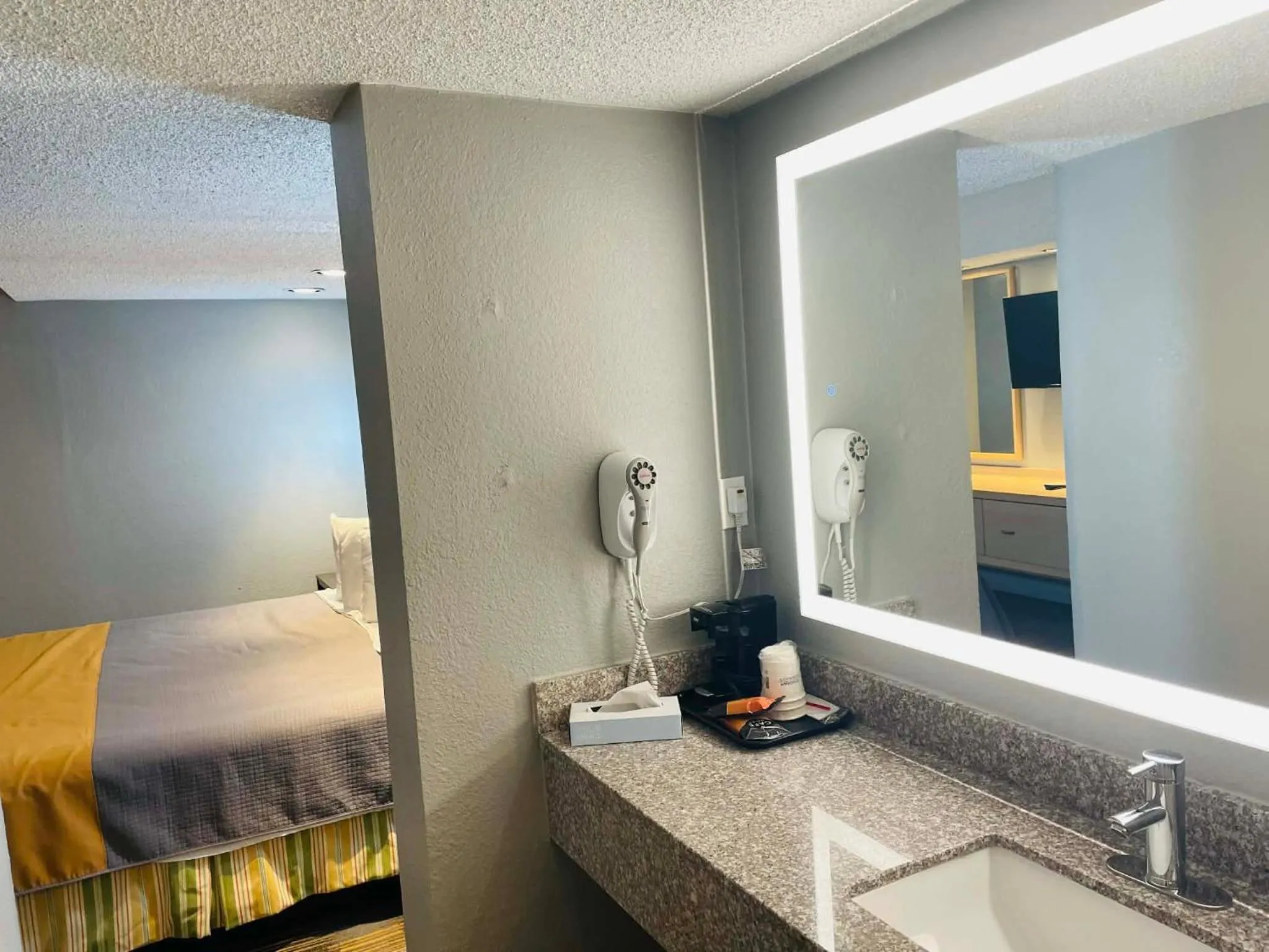 Bed in Travelodge by Wyndham Sellersburg