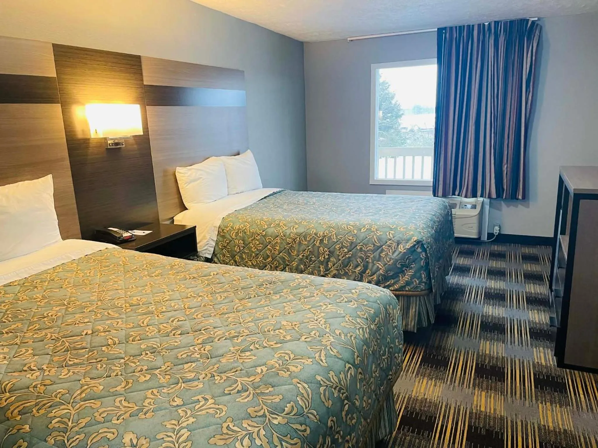 Bed in Travelodge by Wyndham Sellersburg