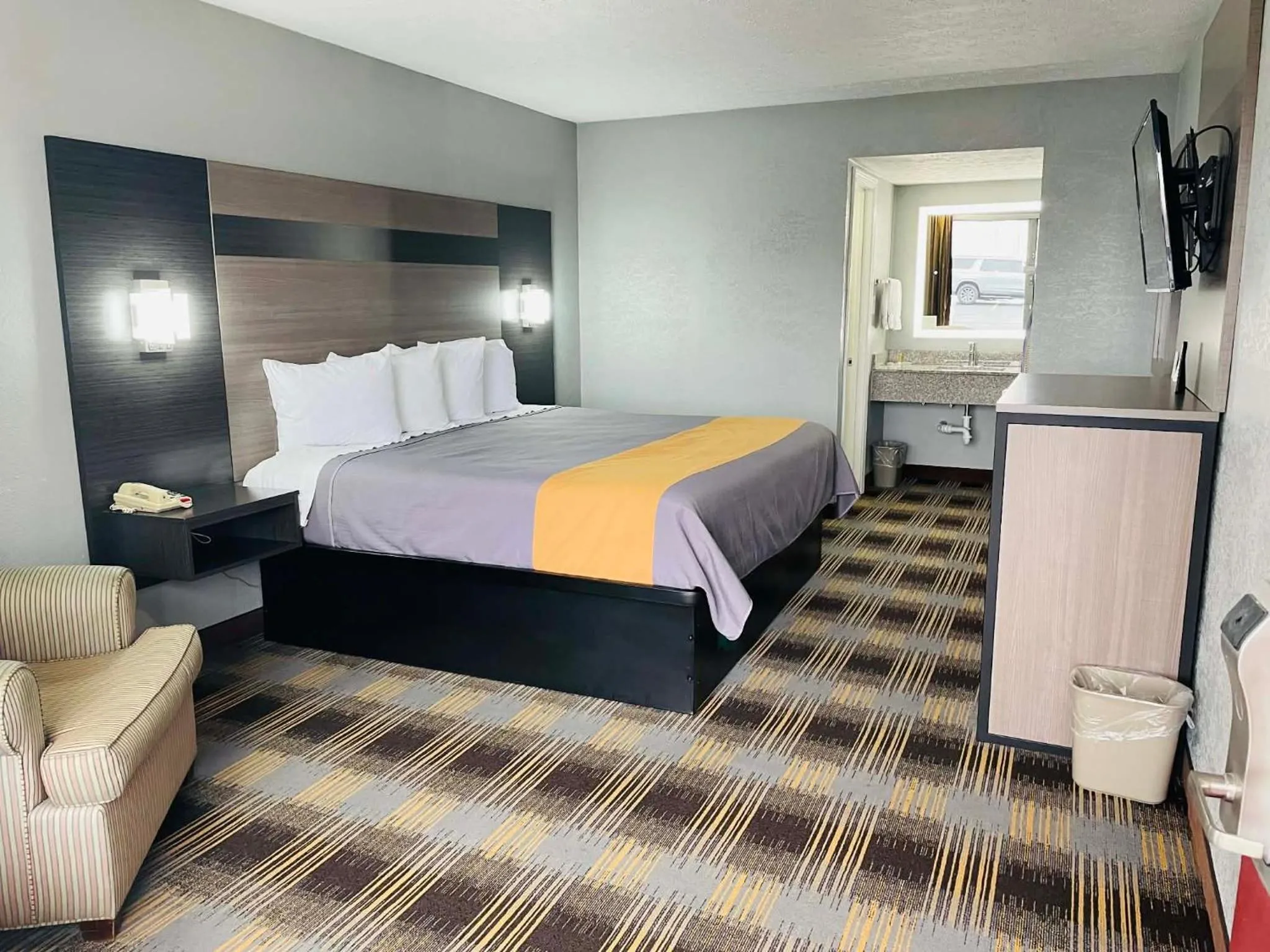 Bed in Travelodge by Wyndham Sellersburg