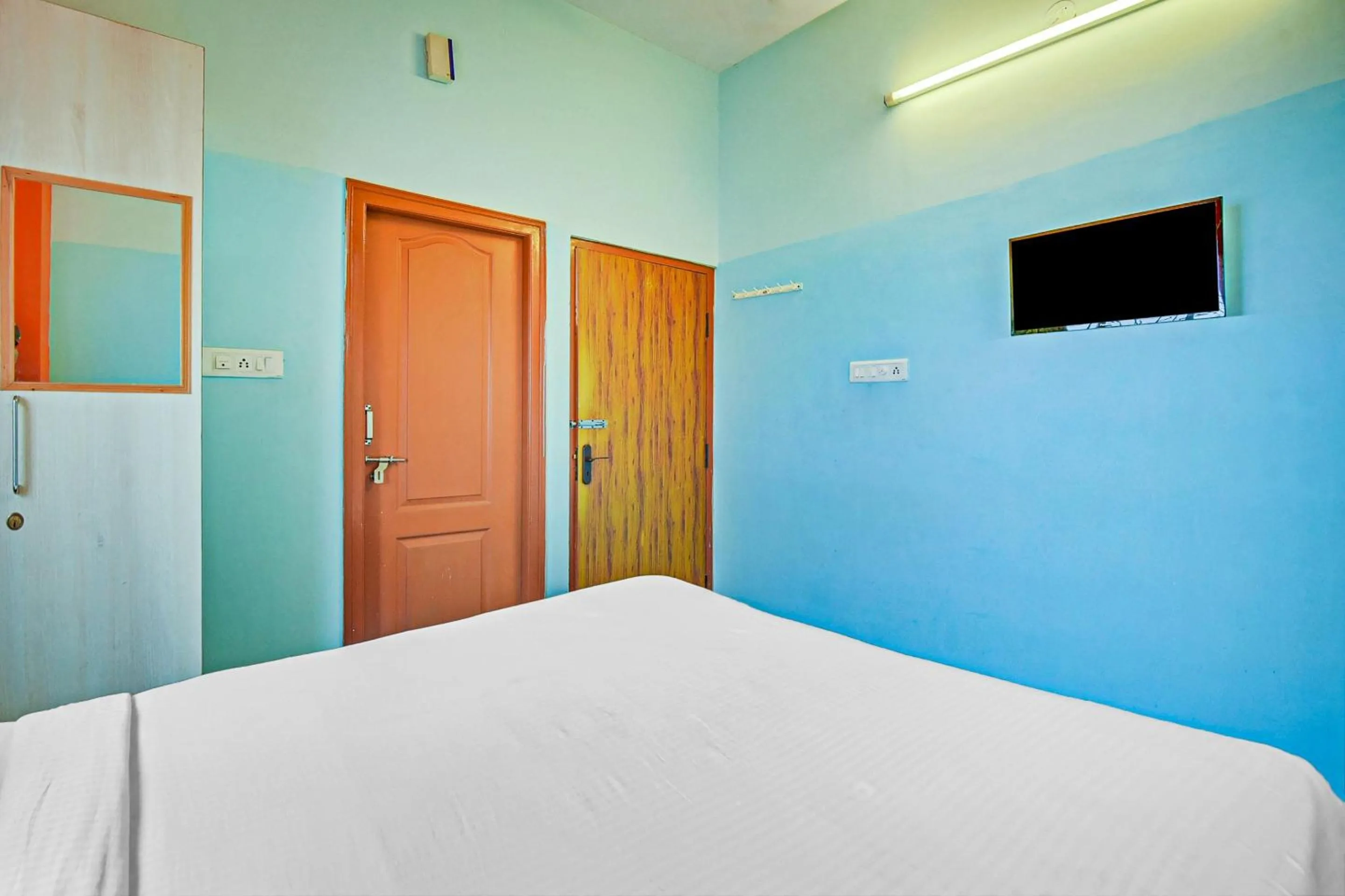 Bedroom, Bed in Hotel O Sri Sai Guru Comforts