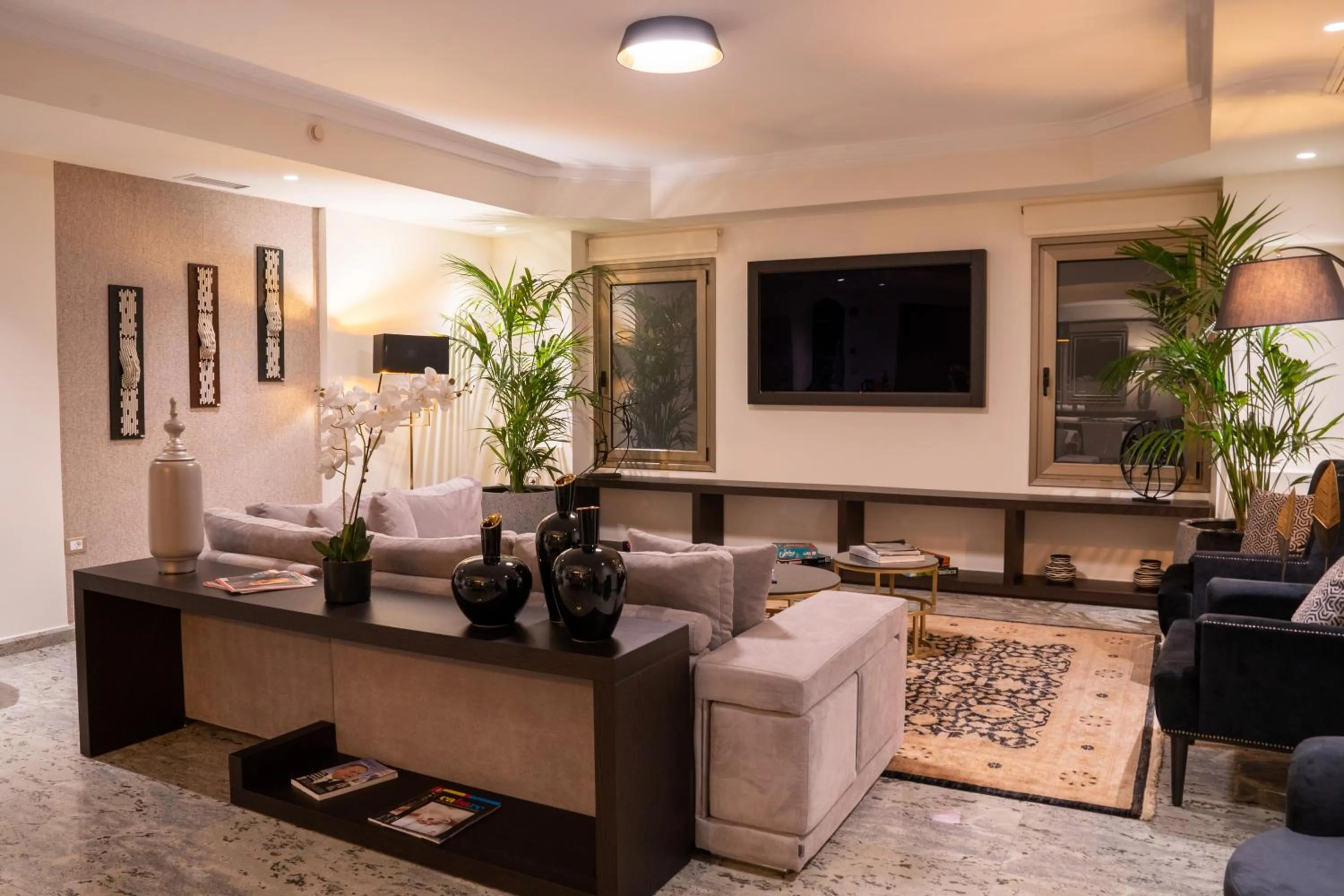 Communal lounge/ TV room in My Way Hotel & Events