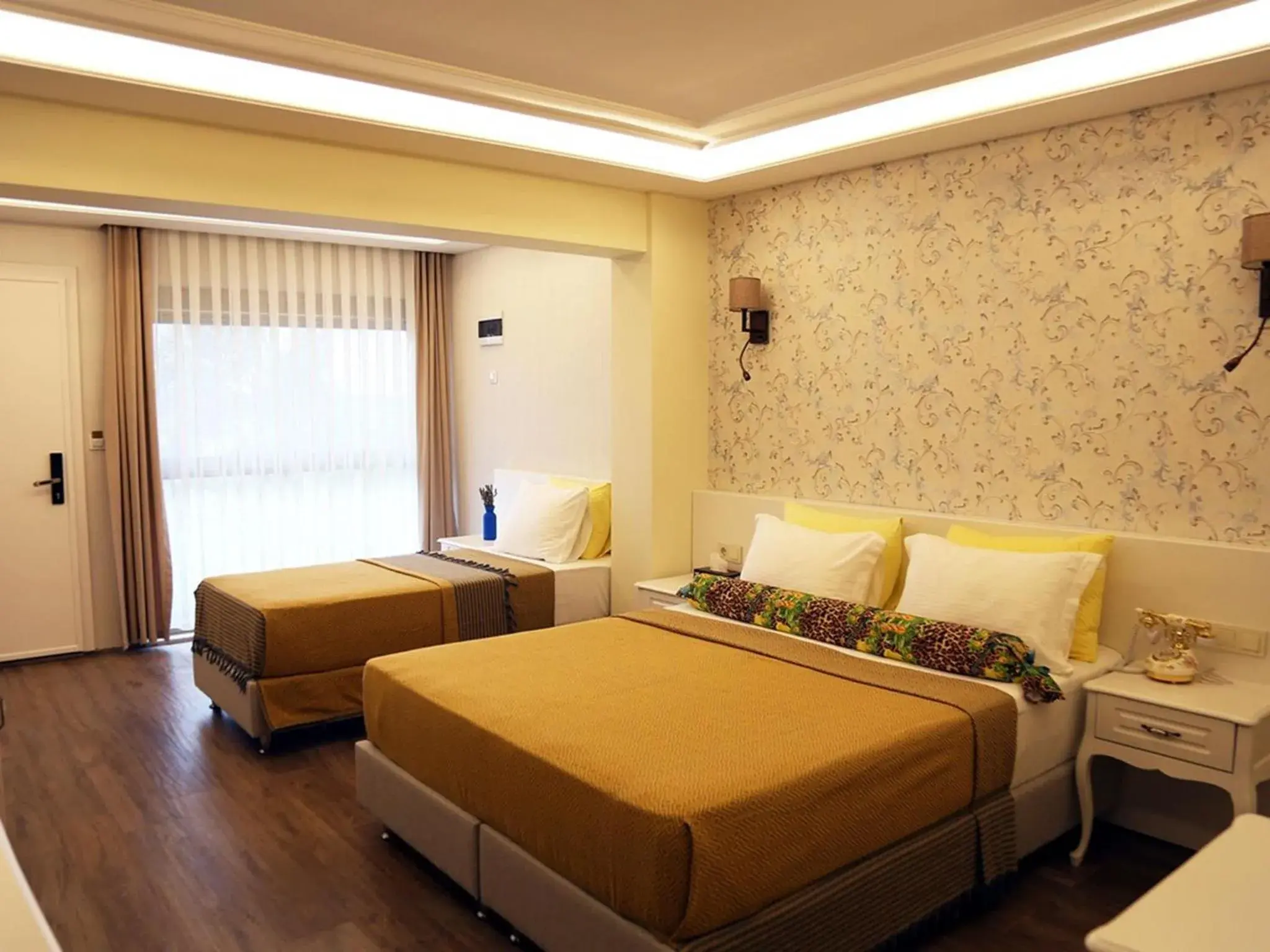 Deluxe Triple Room in Assos Longevity Hotel Deluxe Triple Room in Assos Longevity Hotel