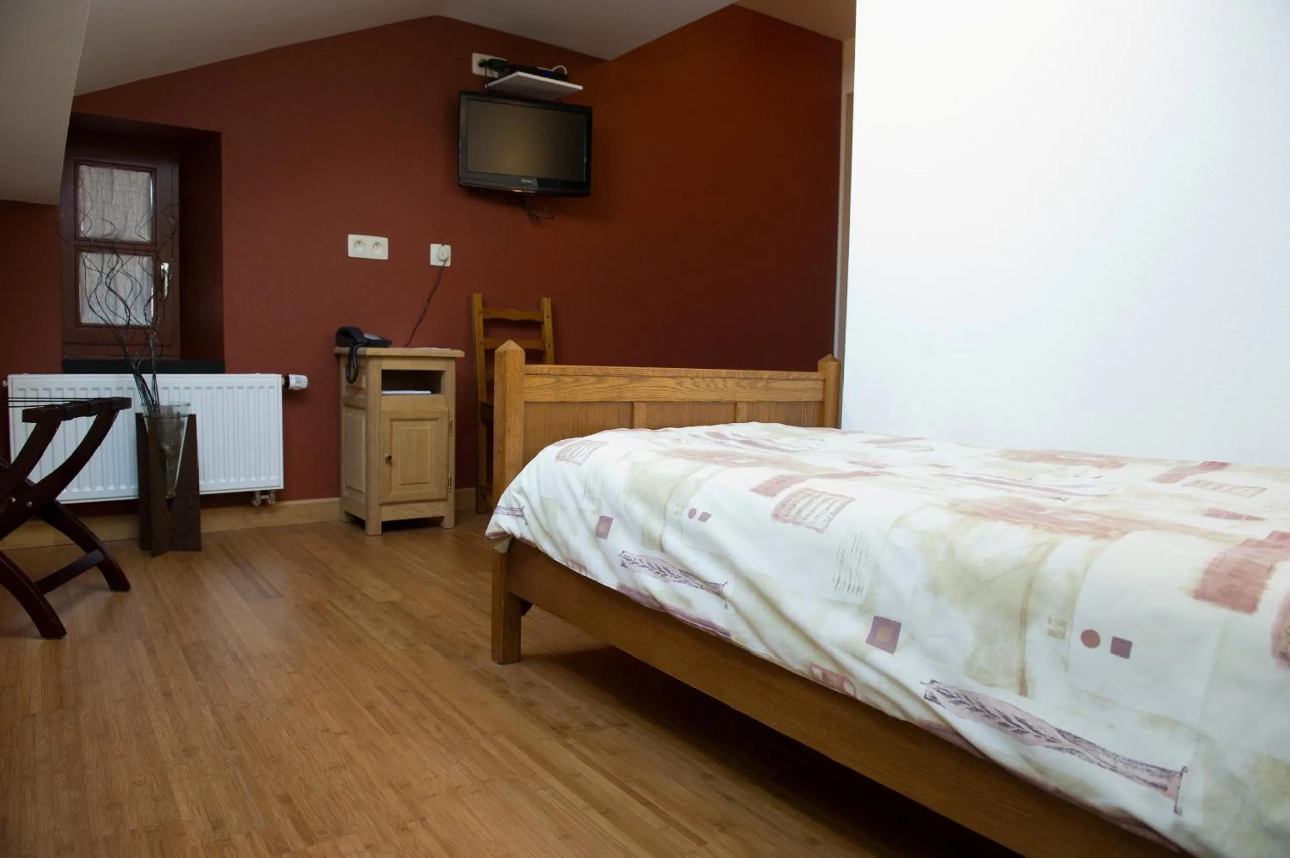 Decorative detail, Bed in Auberge Saint-Martin