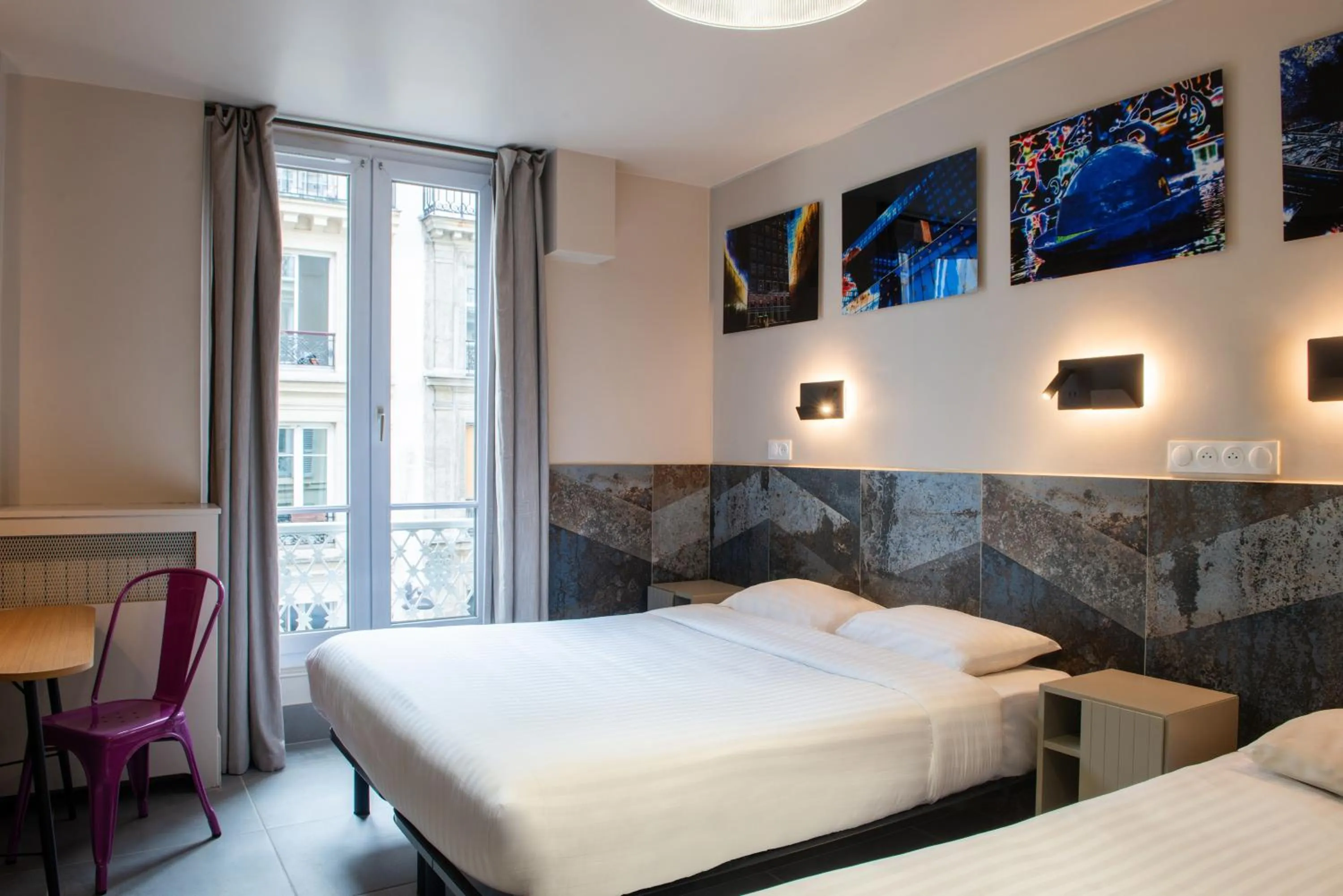 Bed in Hôtel de Roubaix