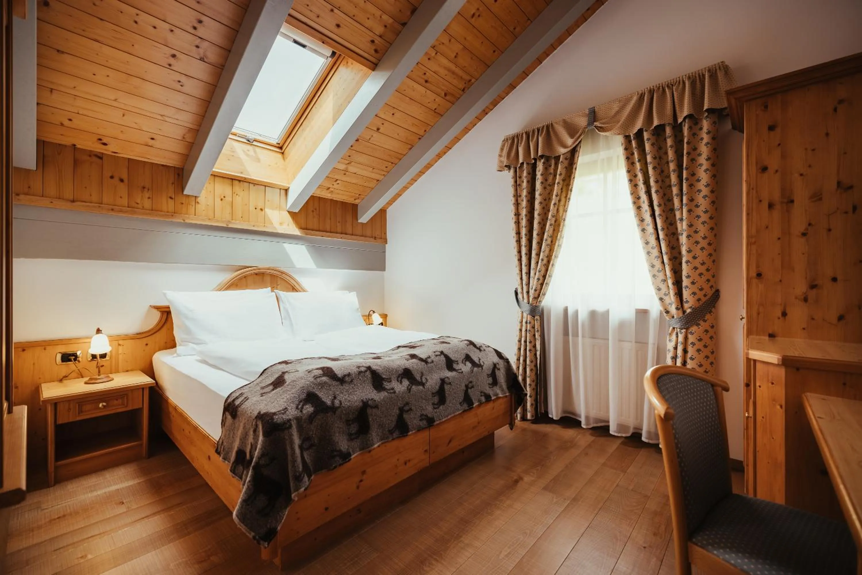 Bed in Hotel Alpenrose