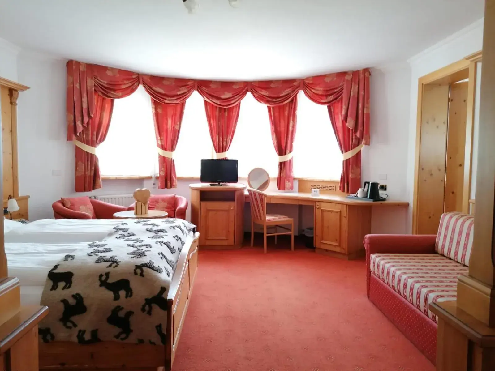 Quadruple Room in Hotel Alpenrose Quadruple Room in Hotel Alpenrose