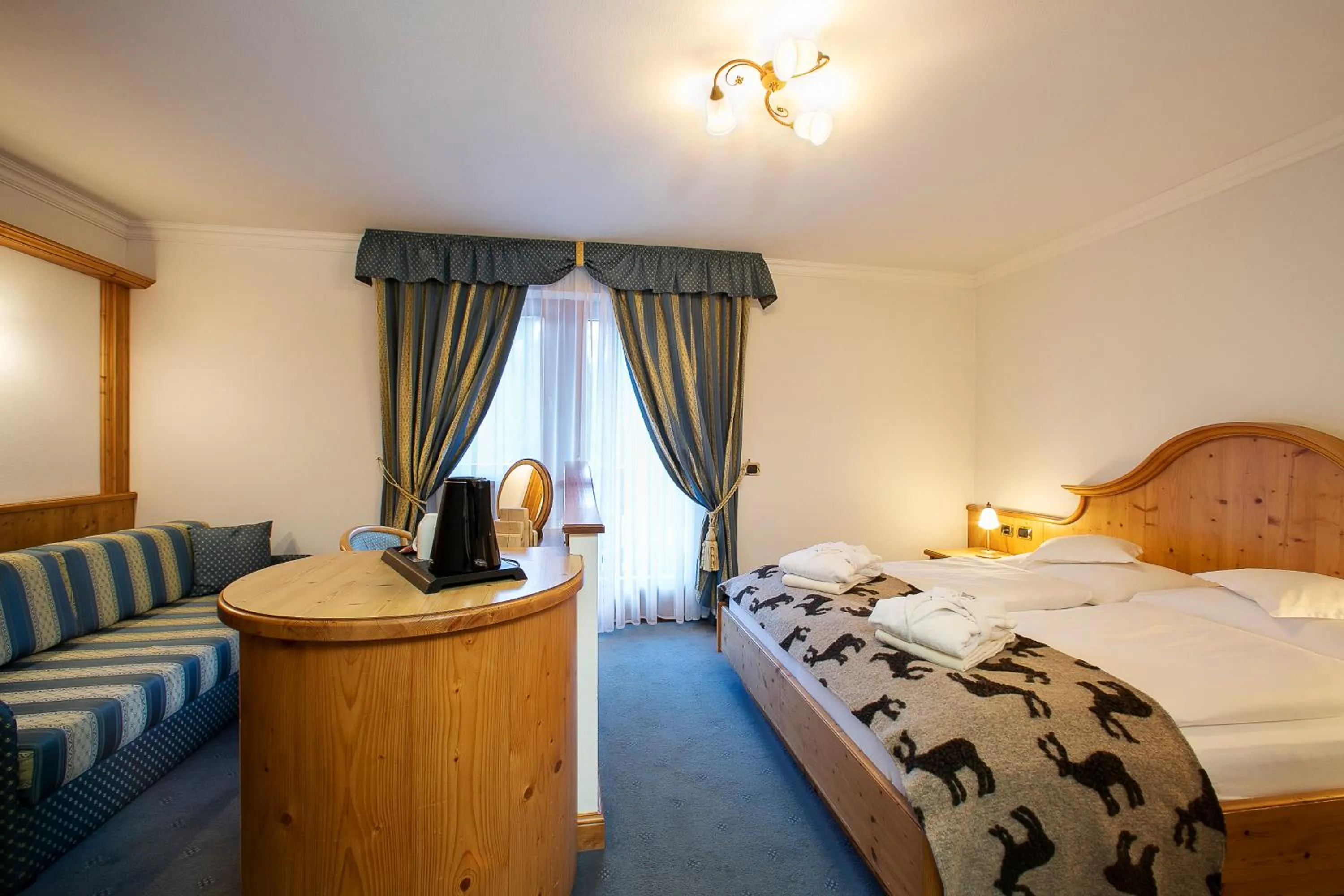 Bed in Hotel Alpenrose