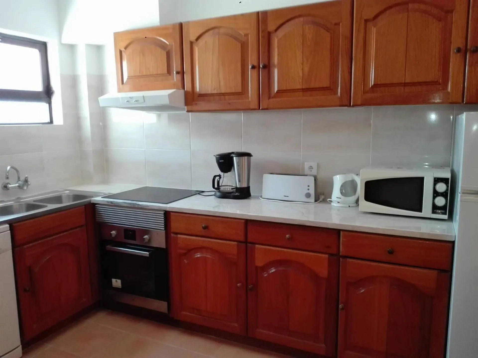 Kitchen or kitchenette in Apartamentos da Balaia