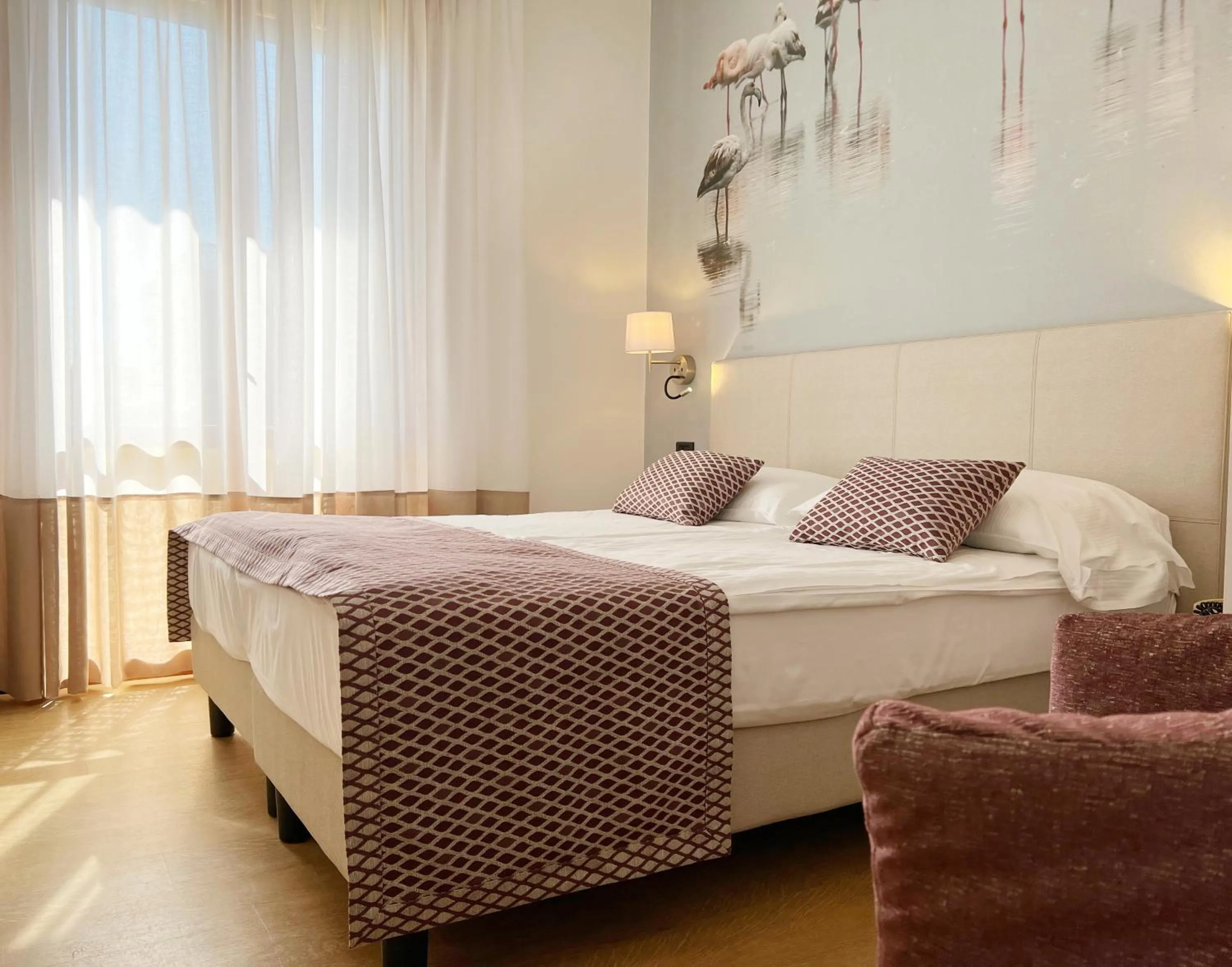 Bed in Junior Family Hotel