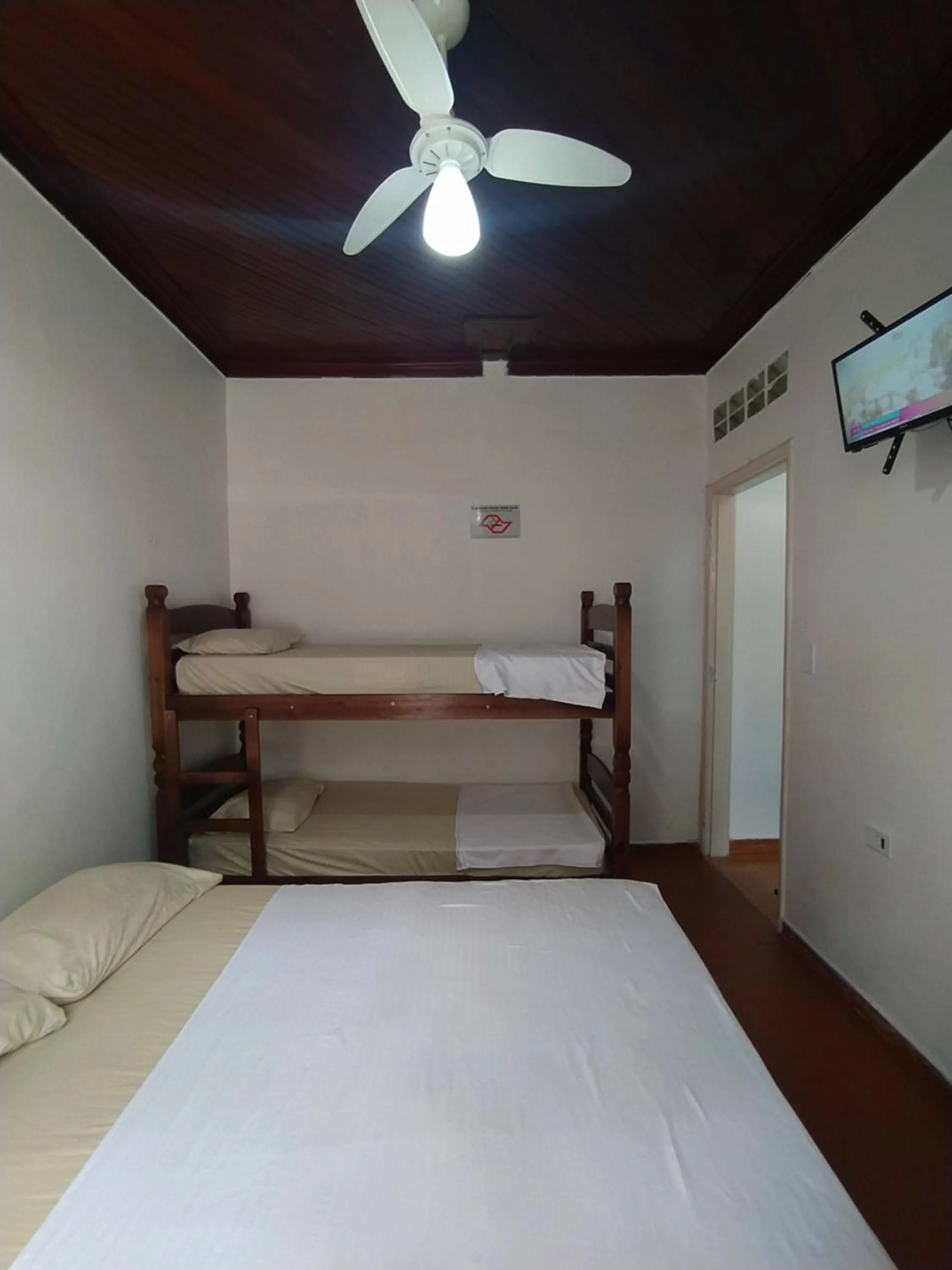 Bed in Pousada Recanto da Praia