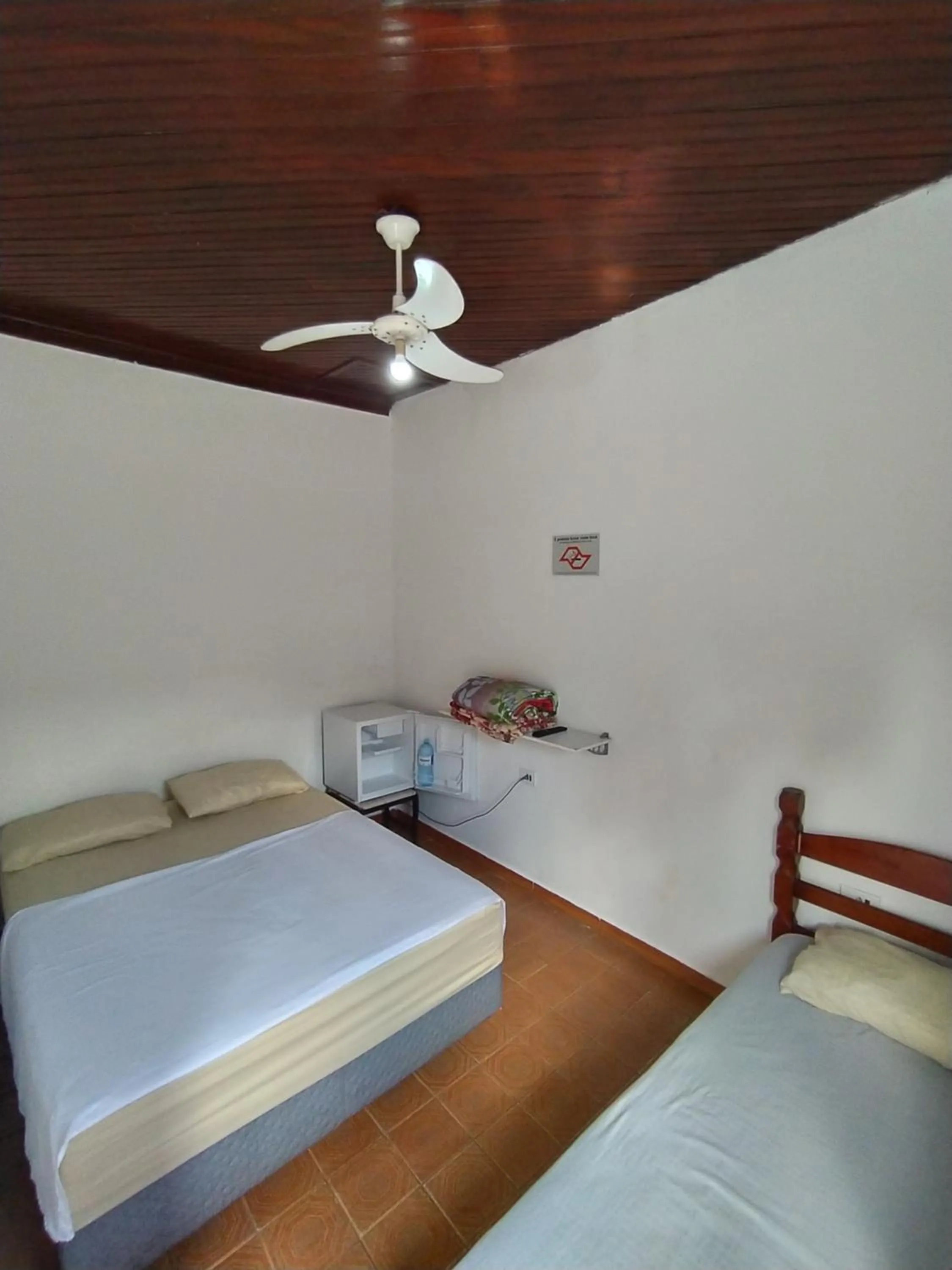 Bed in Pousada Recanto da Praia