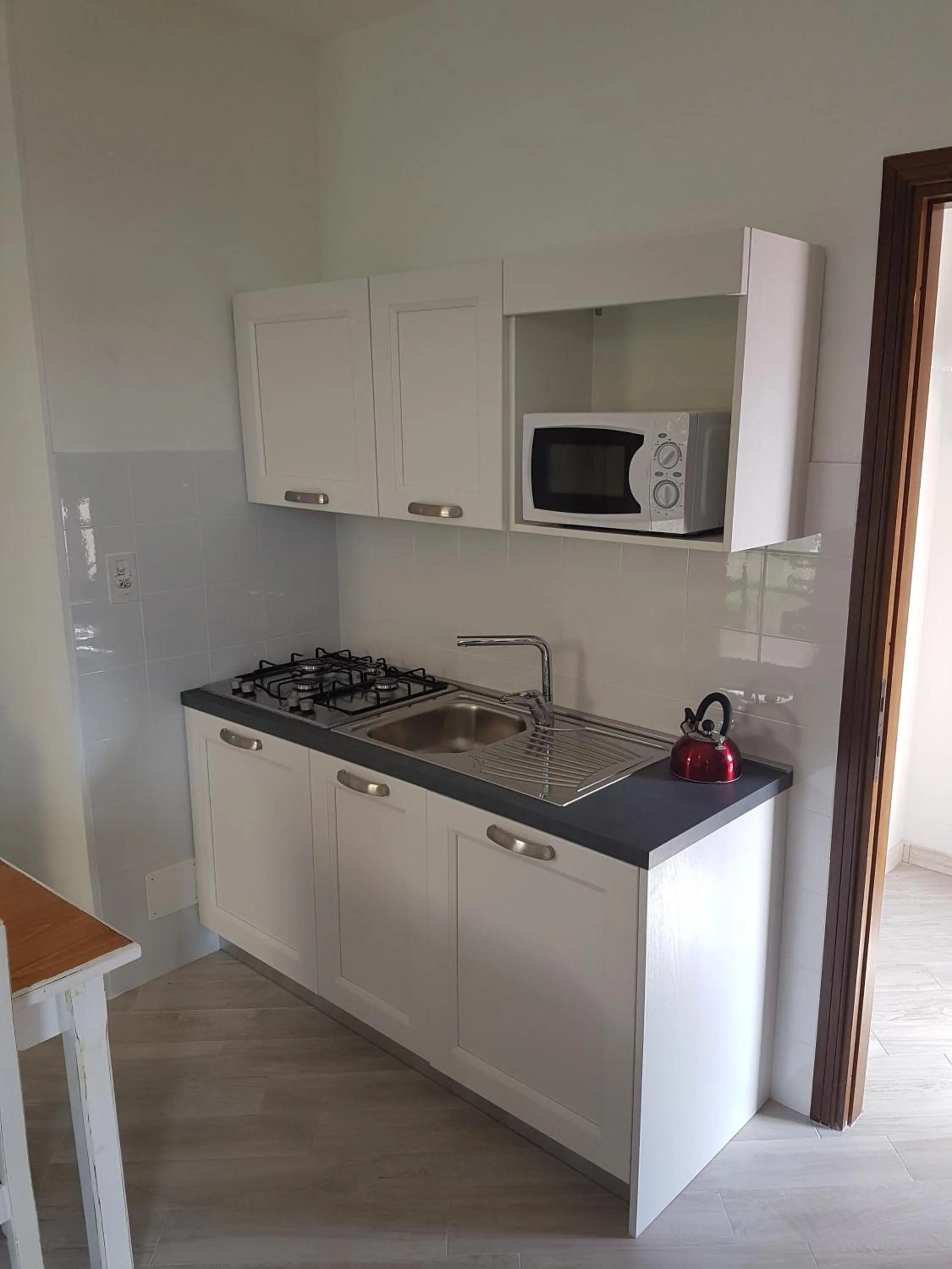 Kitchen or kitchenette in Residence La Meridiana