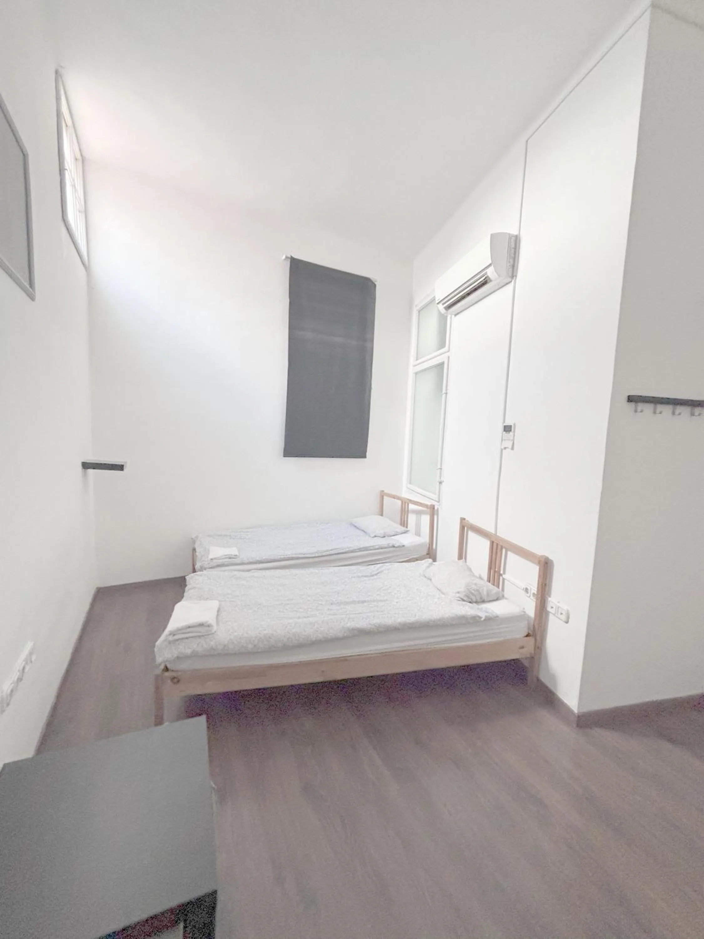 Photo of the whole room, Bed in Artist Guest House