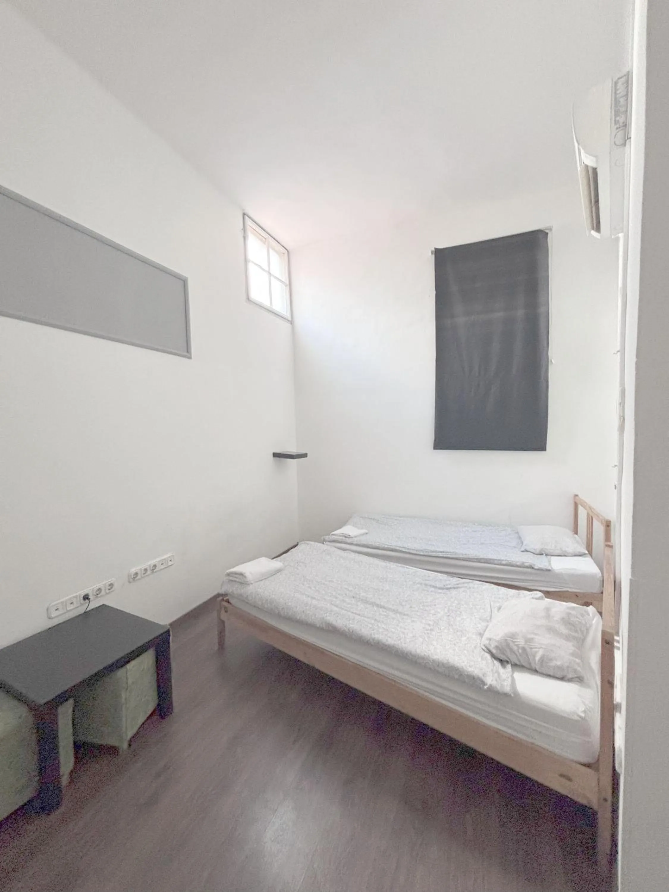 Photo of the whole room, Bed in Artist Guest House