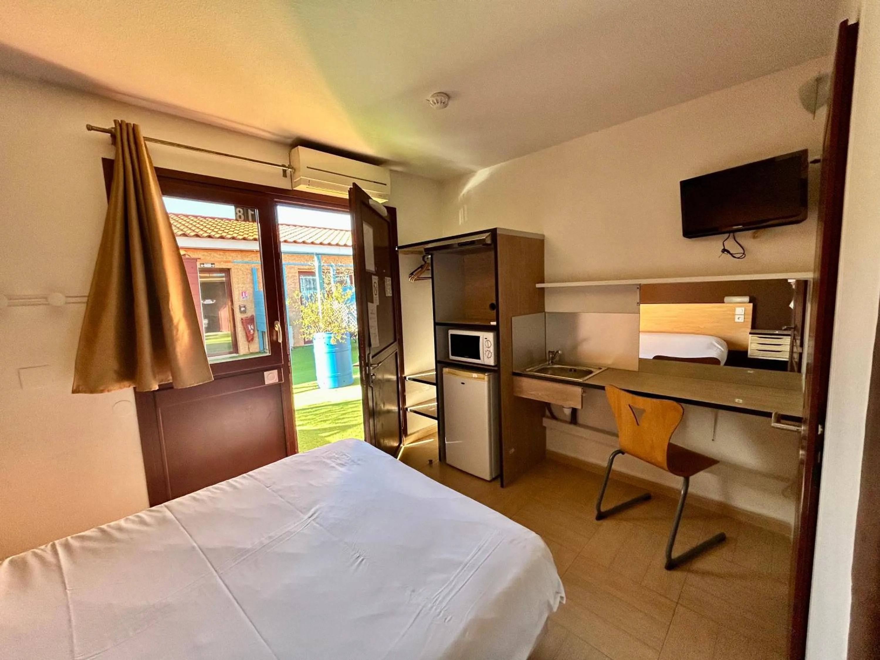 Bed in Hôtel Acajou