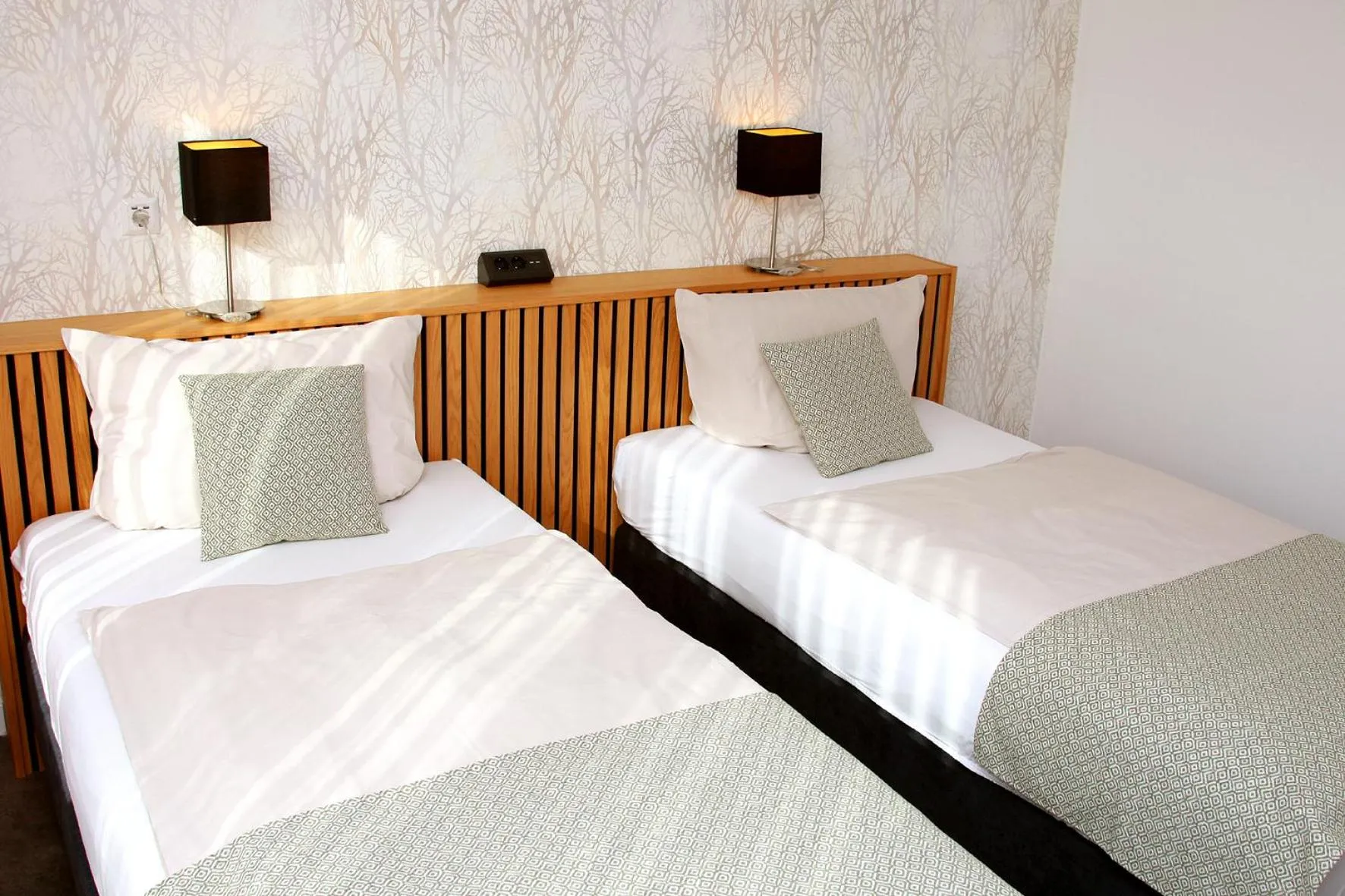 Bed in Hotel Quellenhof