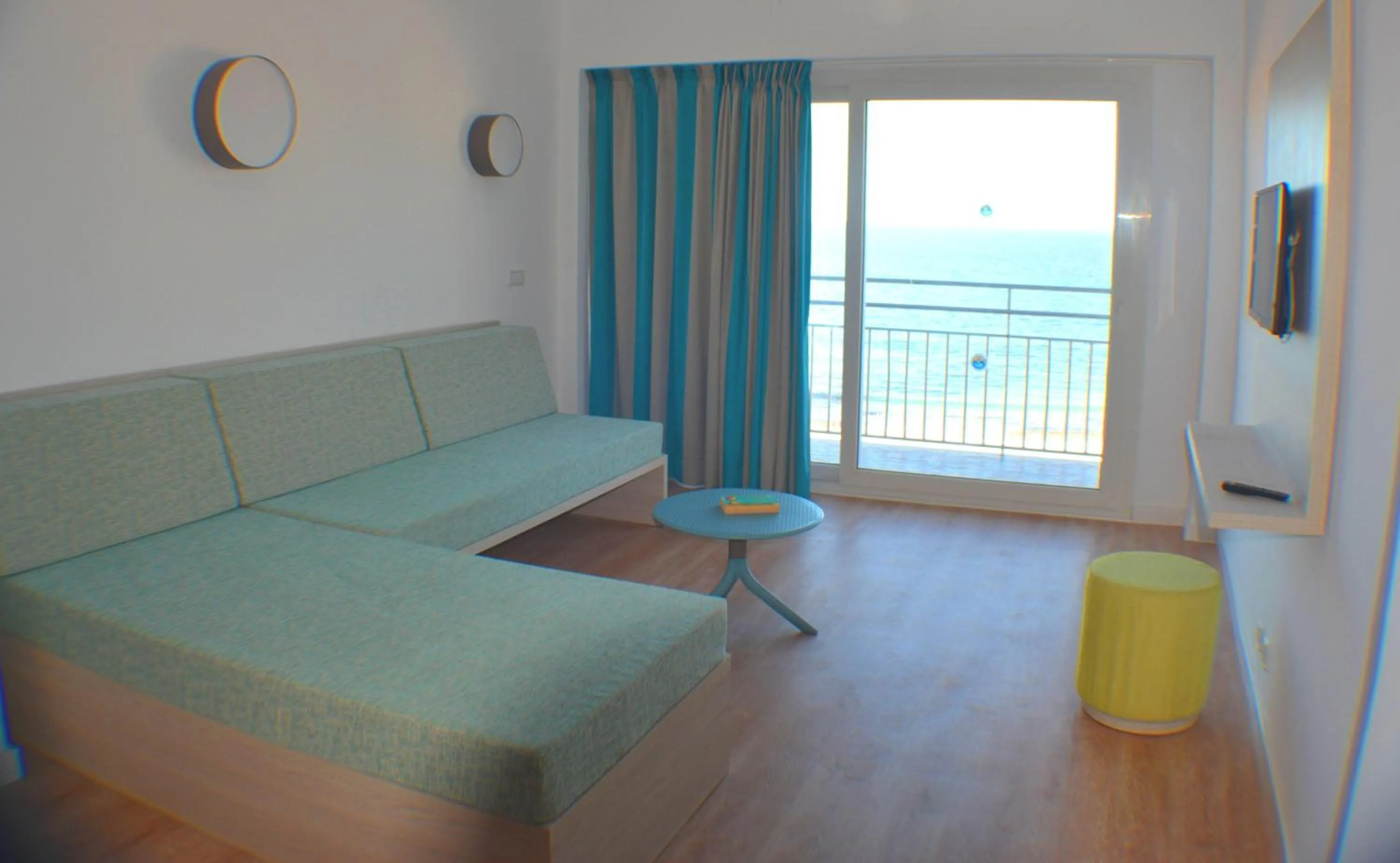 Living room, Bed in Apartamentos Playa Moreia