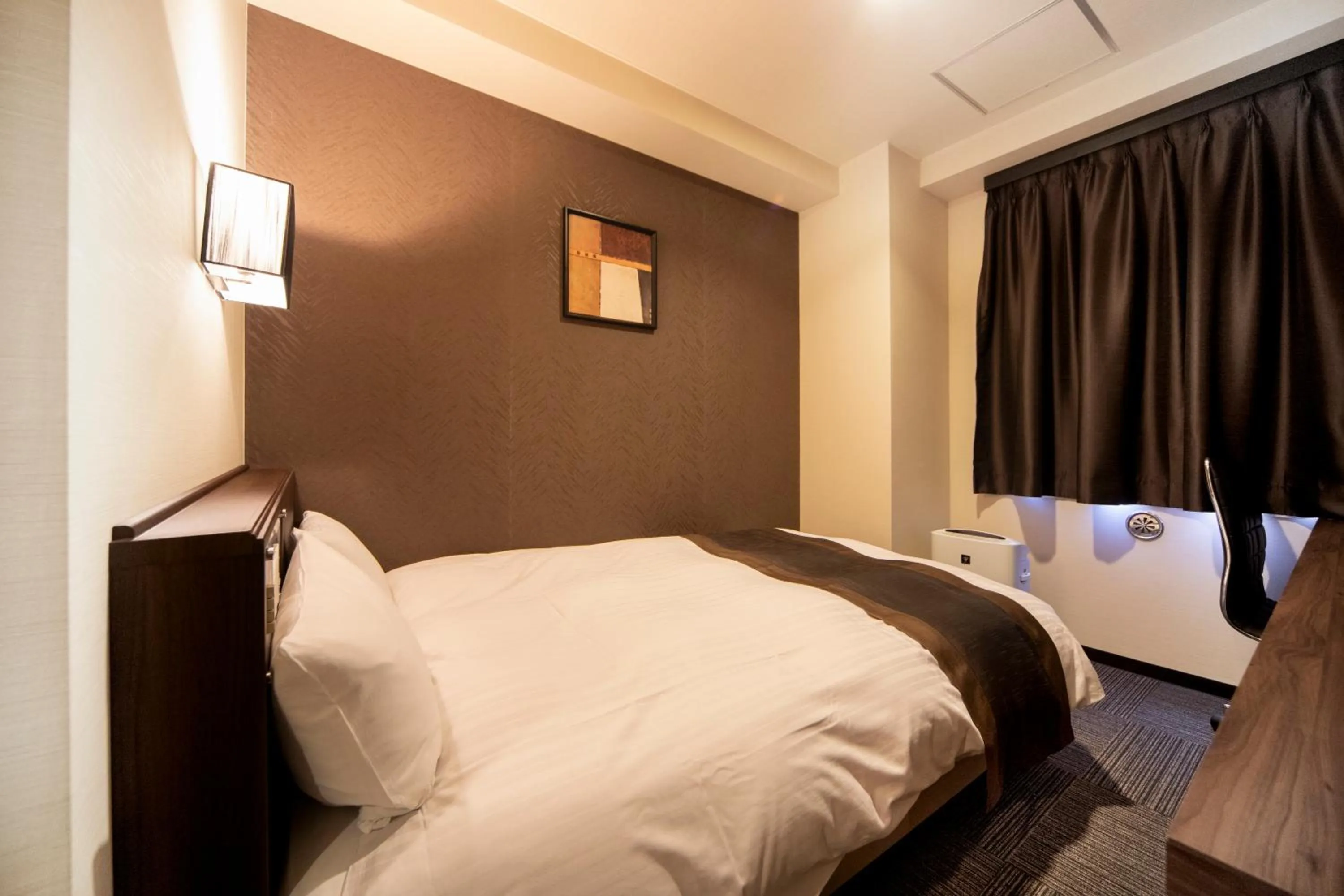 Bed in The Grandeur Hotel