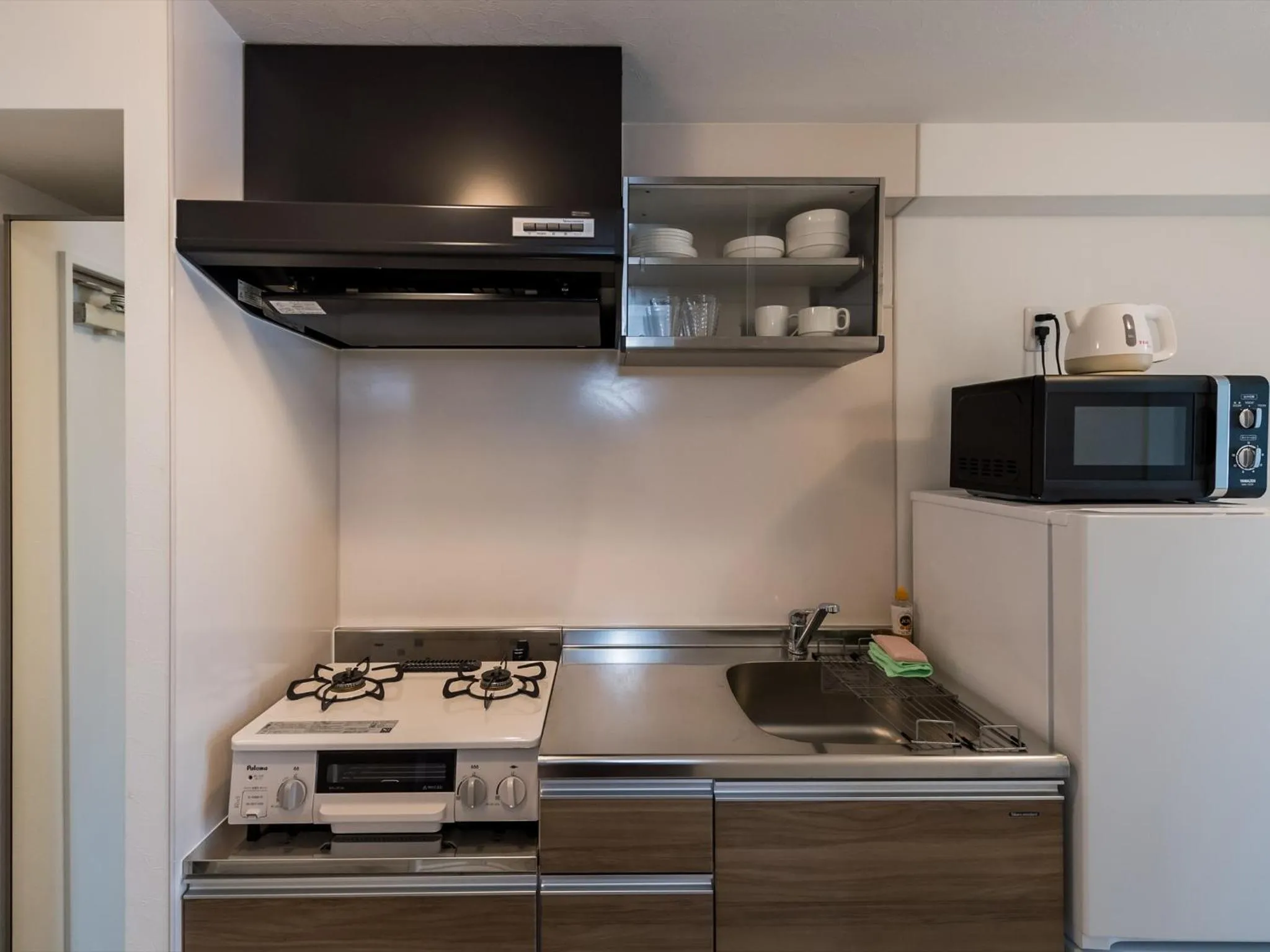 Kitchen or kitchenette in Hotel Tomas Nago