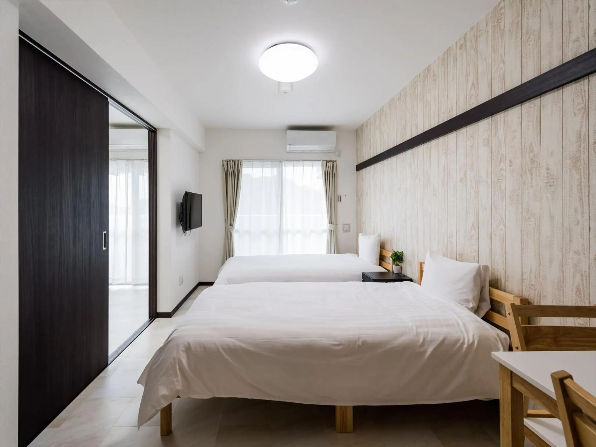 Bed in Hotel Tomas Nago