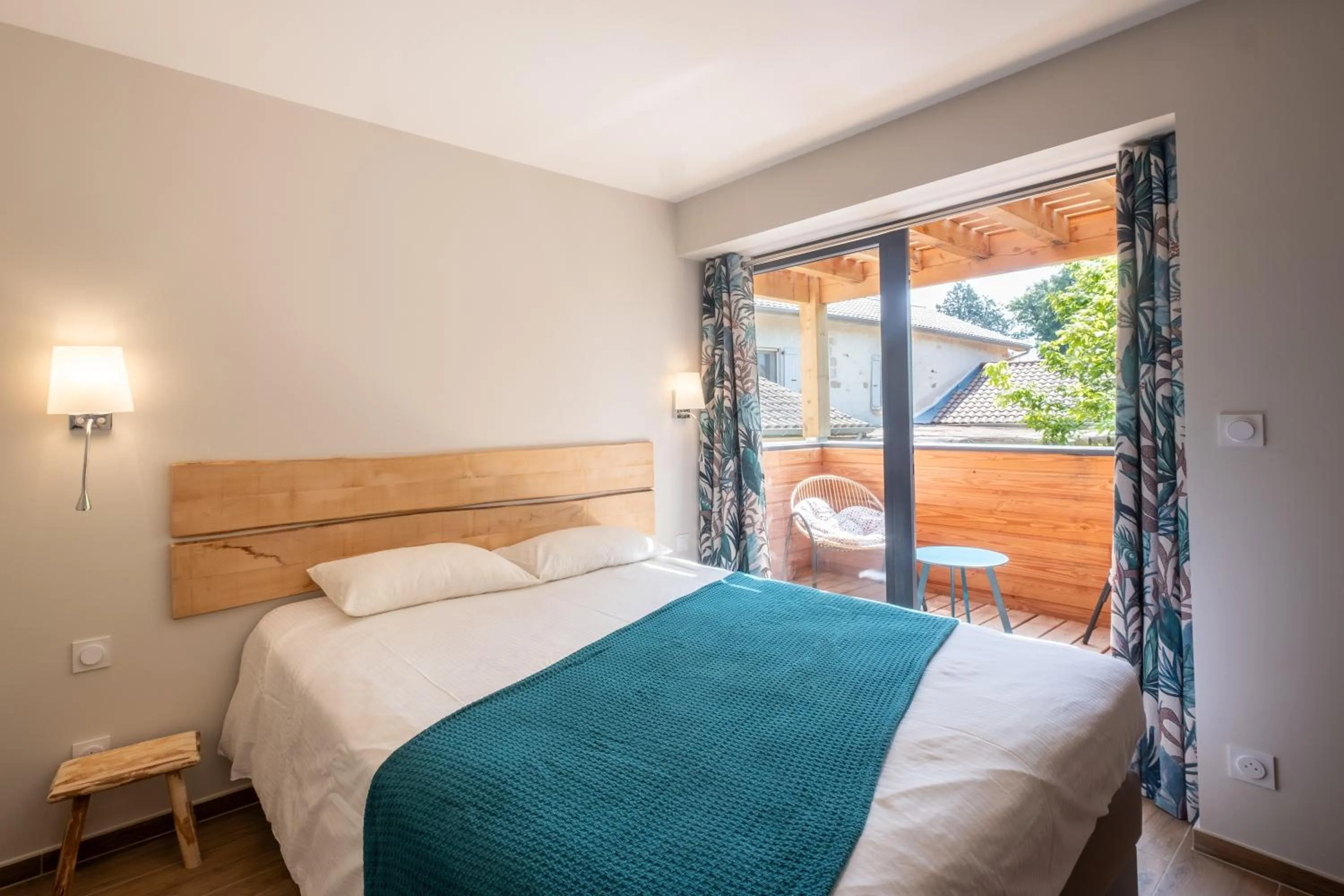 Bed in Logis Hôtel Les Vieilles Granges