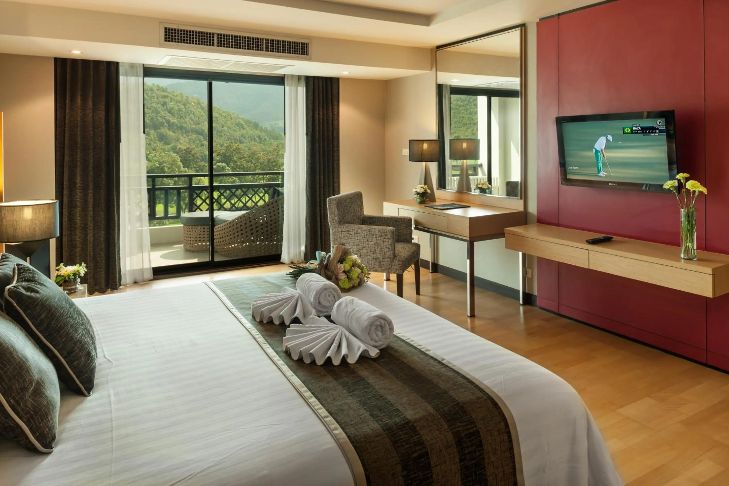 Photo of the whole room, Bed in Alpine Golf Resort Chiang Mai
