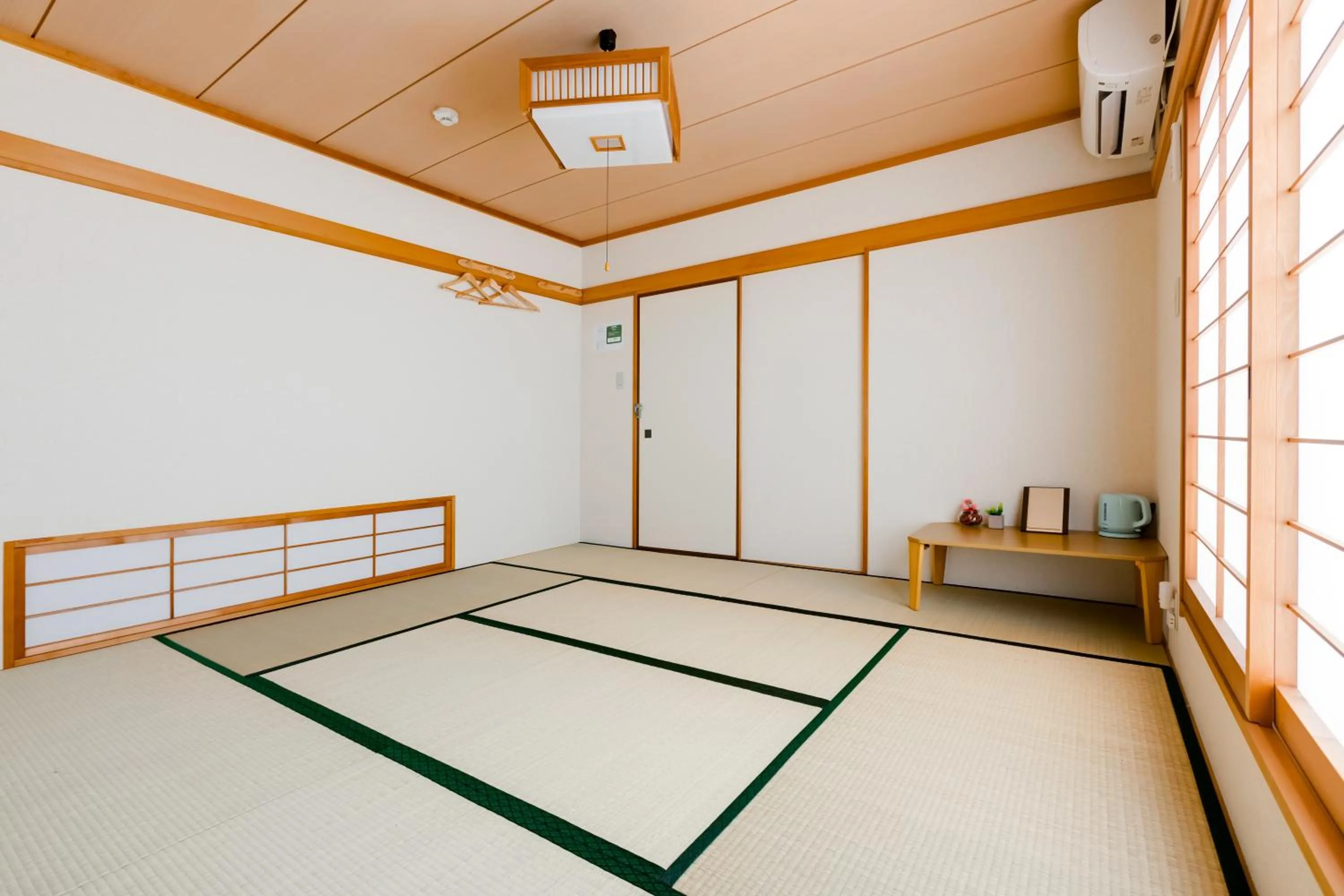 Bed in PLUS 9 Station INN