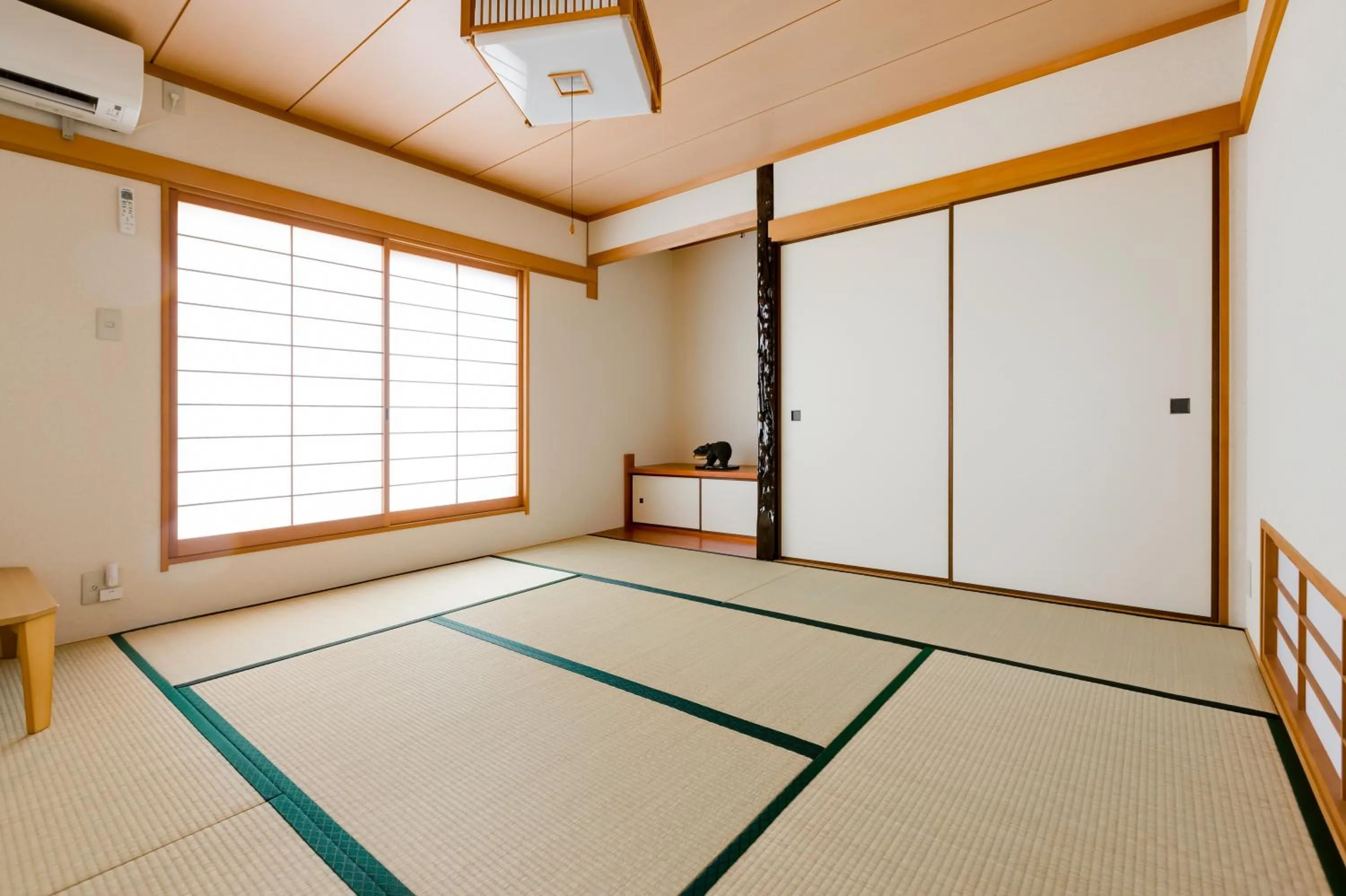 Bed in PLUS 9 Station INN