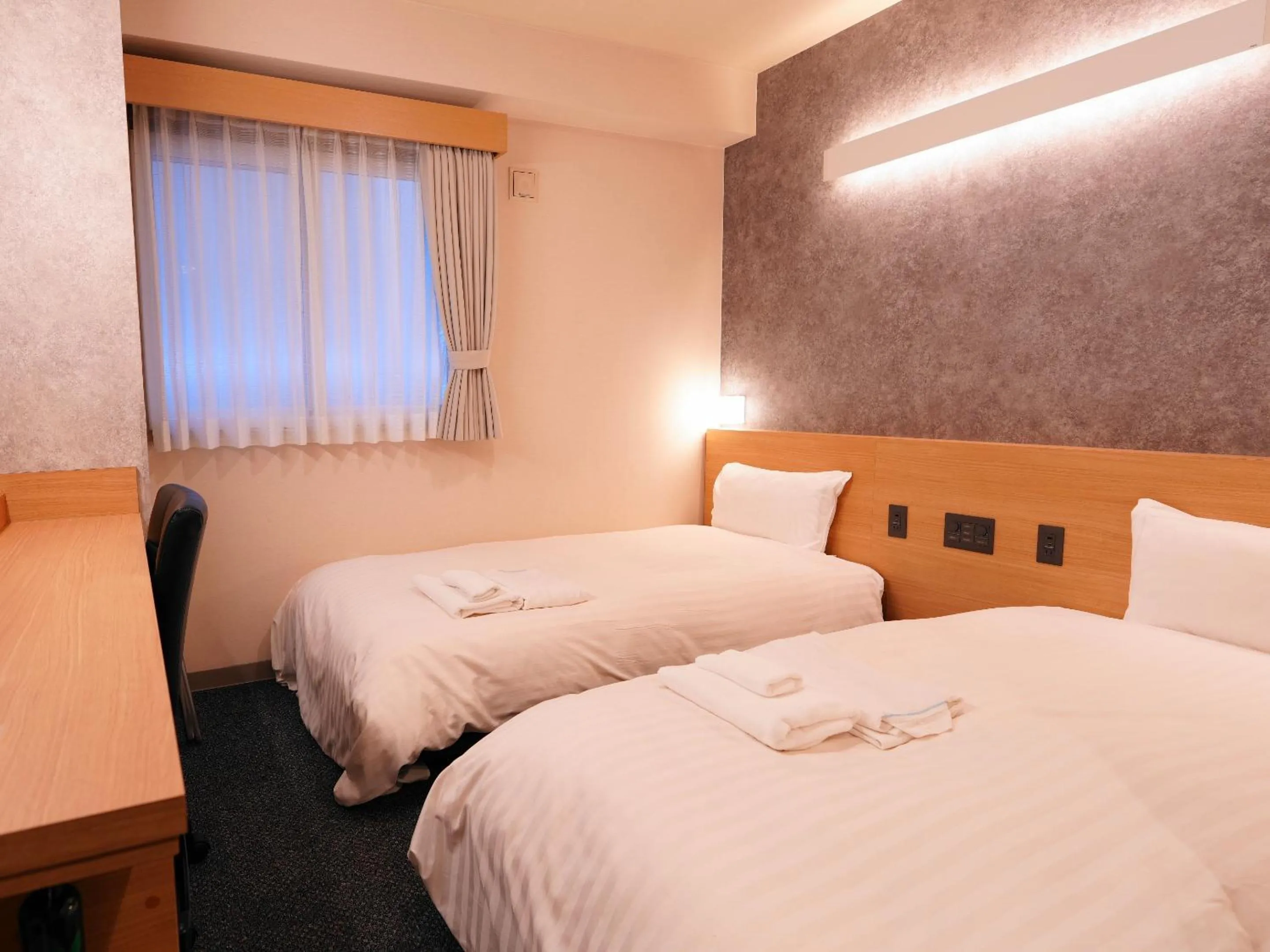 Photo of the whole room, Bed in Asahikawa Sun Hotel