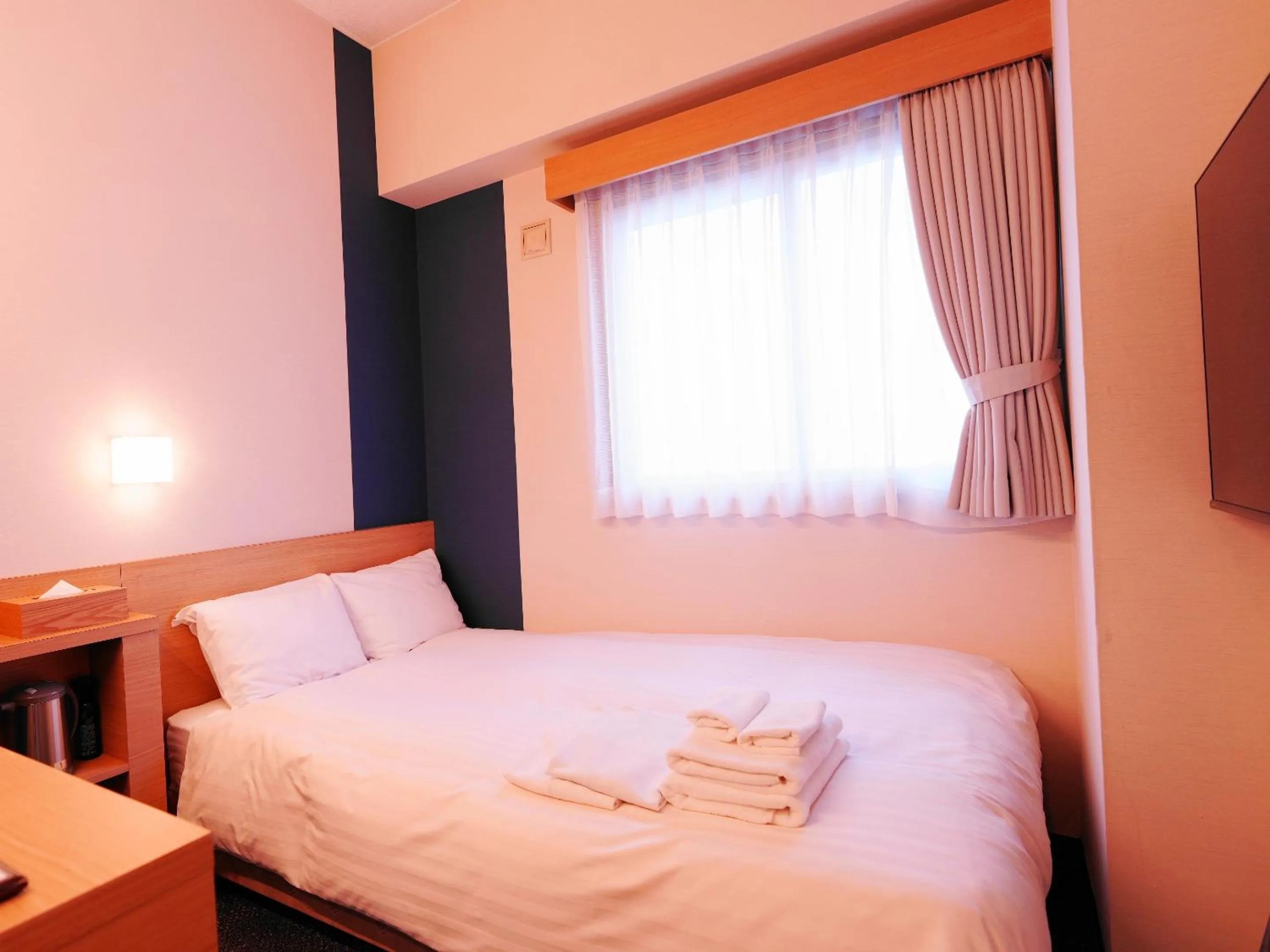 Photo of the whole room, Bed in Asahikawa Sun Hotel