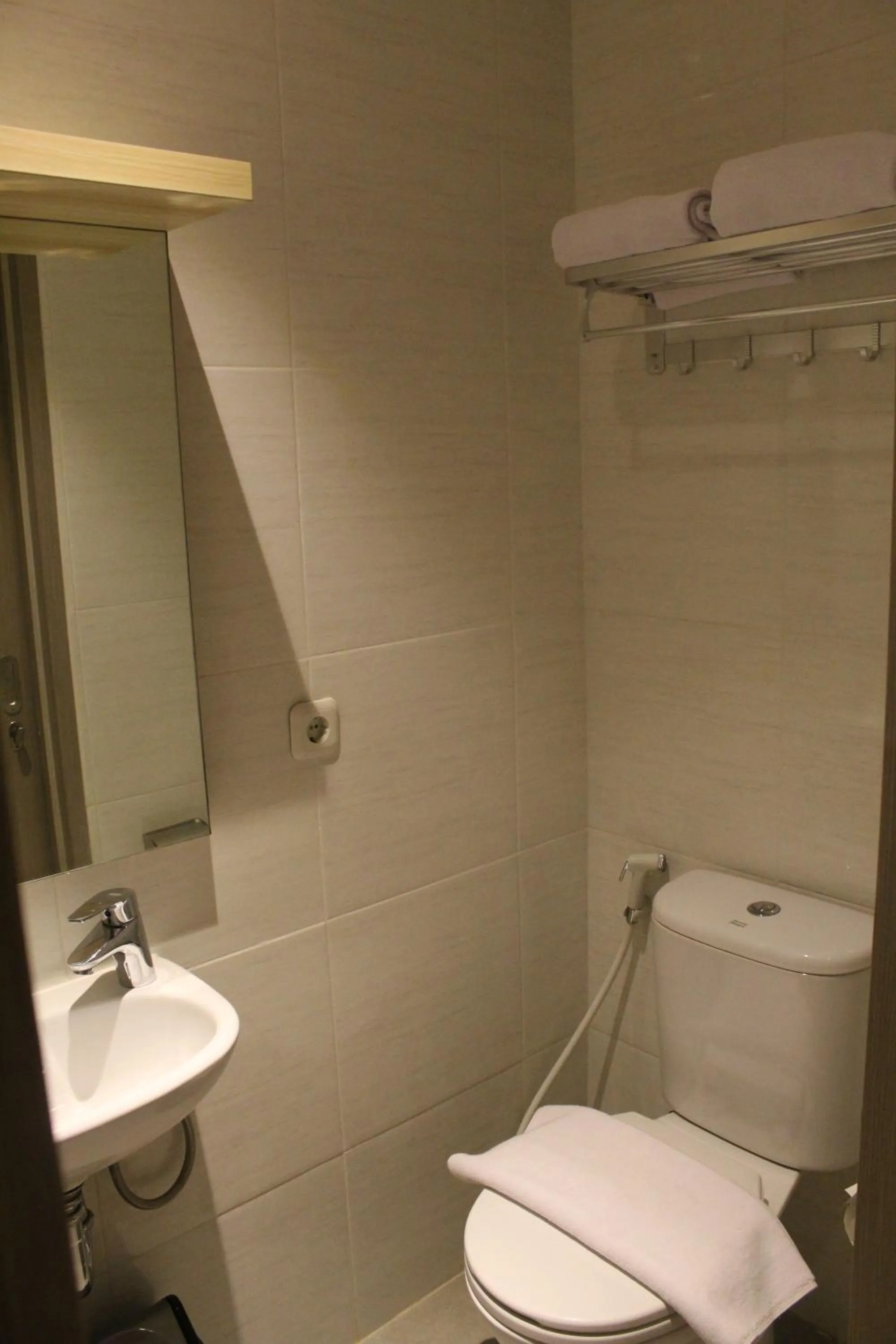 Bathroom in Central Front One Inn Jakarta Airport