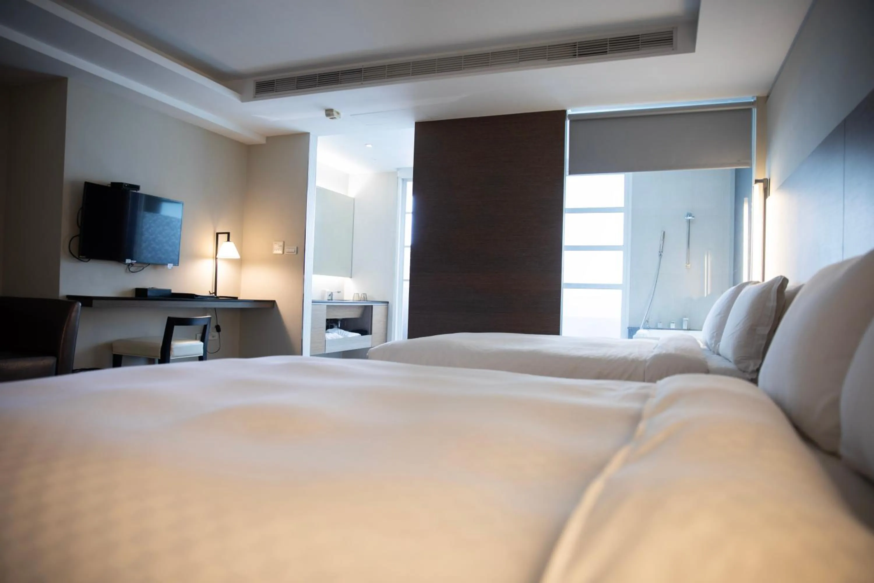 Photo of the whole room, Bed in Kapok Hotel & Resorts