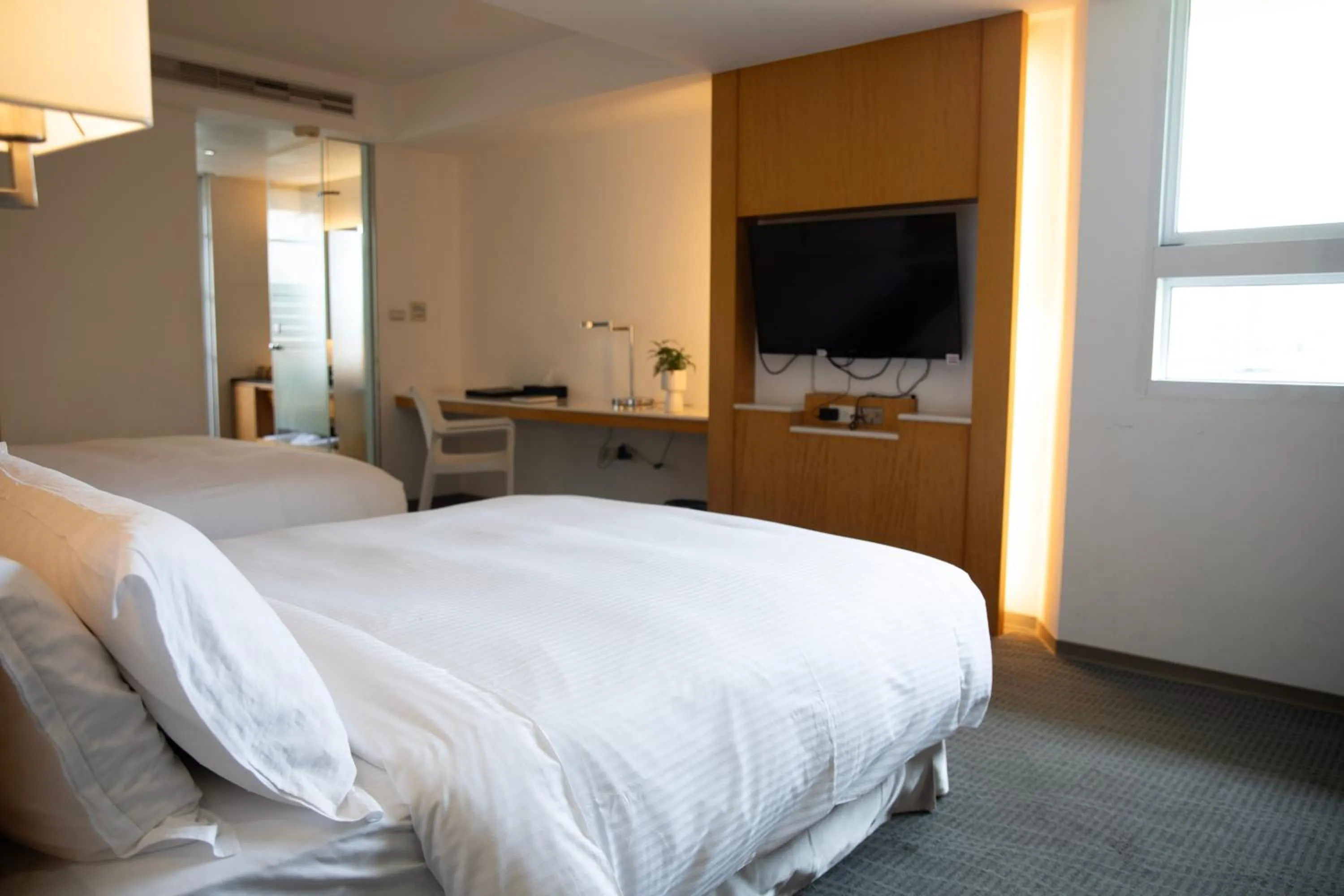 Photo of the whole room, Bed in Kapok Hotel & Resorts