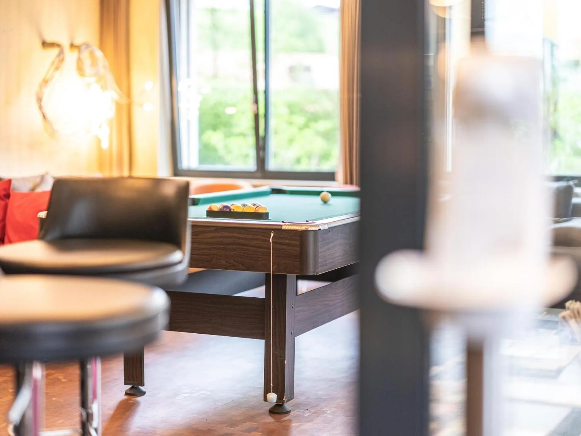 Communal lounge/ TV room in Lodge Hof Weissbad