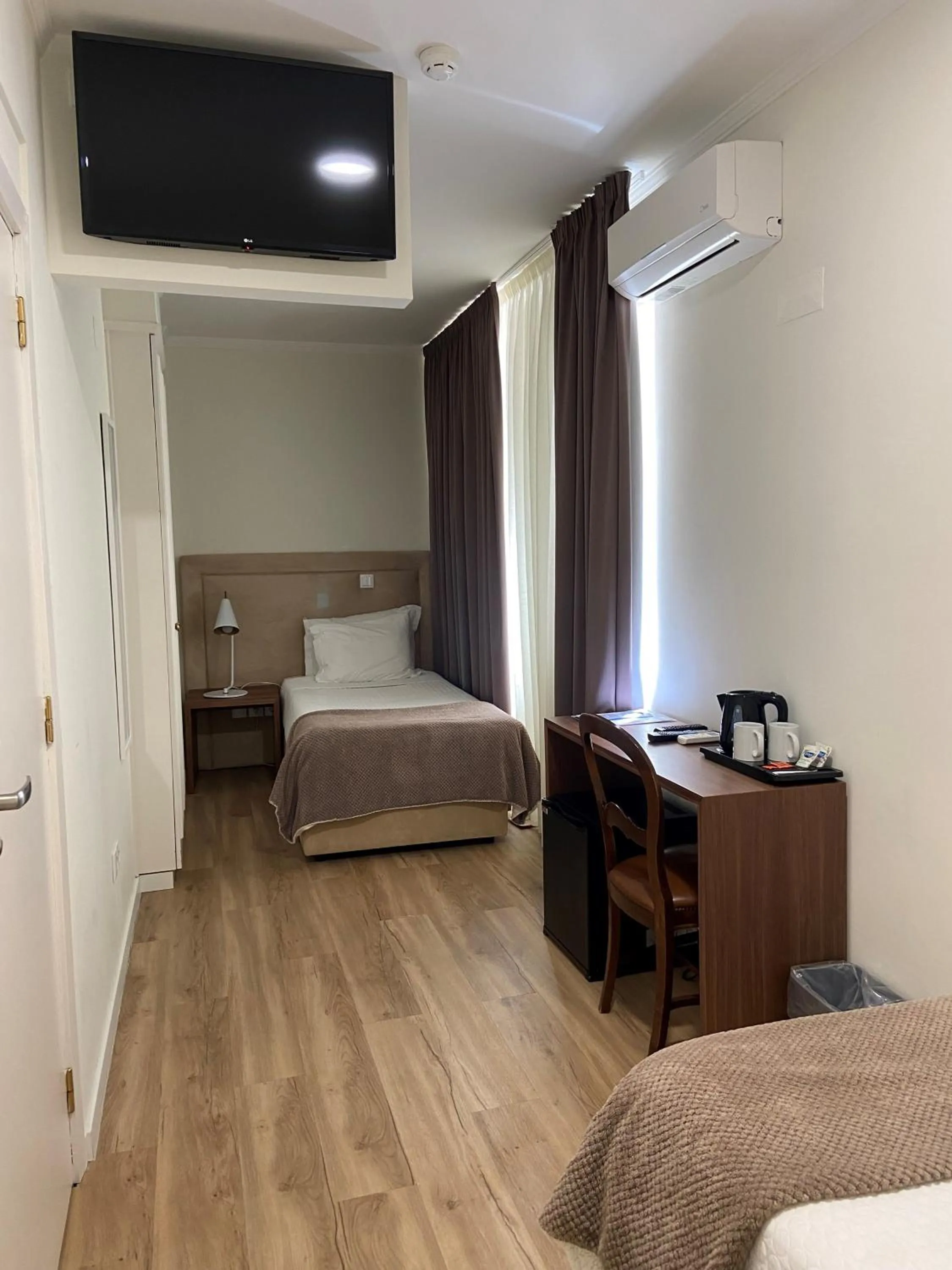 Bed in Hotel Porto Mar