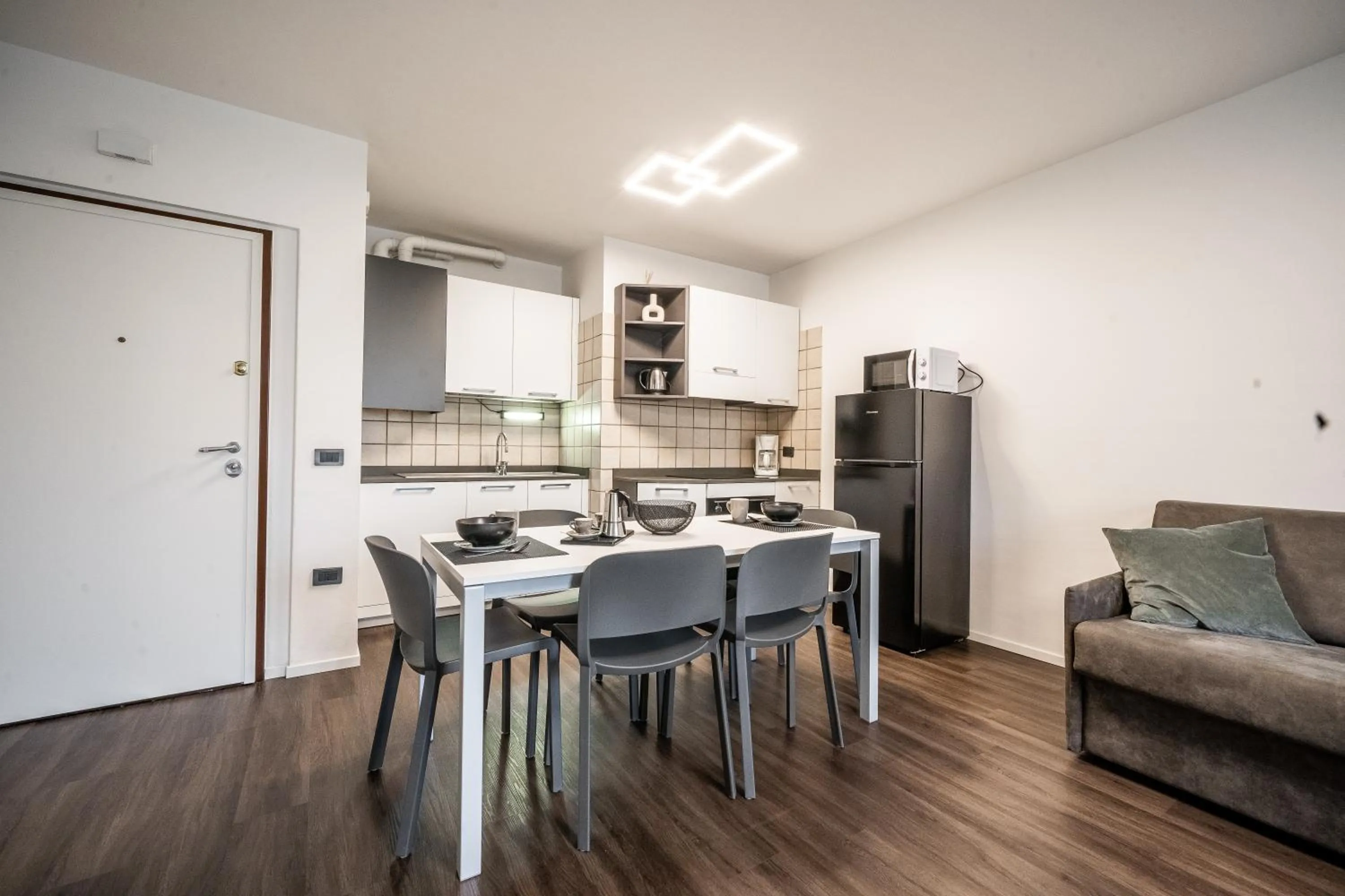 Kitchen or kitchenette in Appartamenti Vasco Renna Surf Center