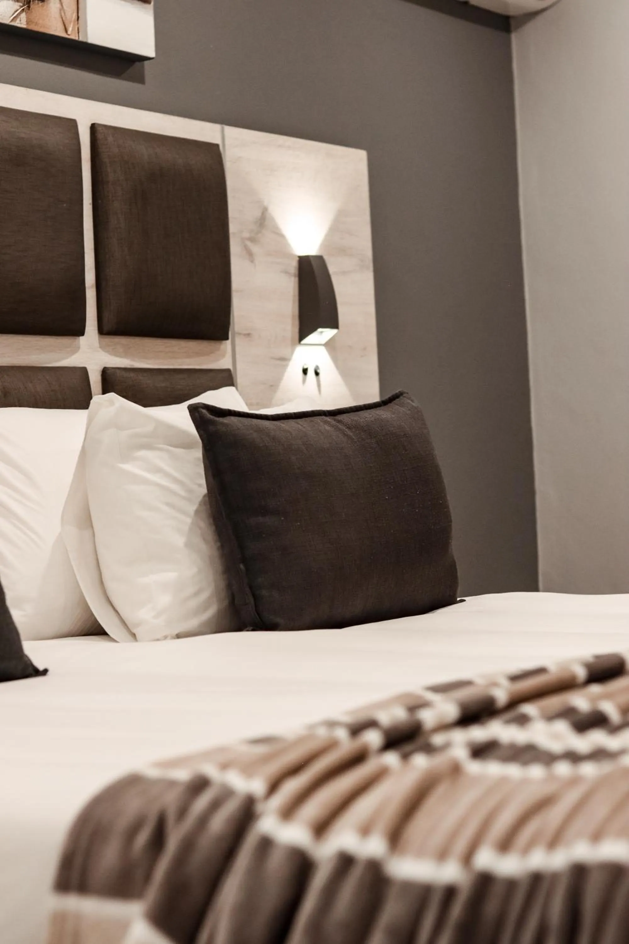 Bed in Cascades Guest Lodge