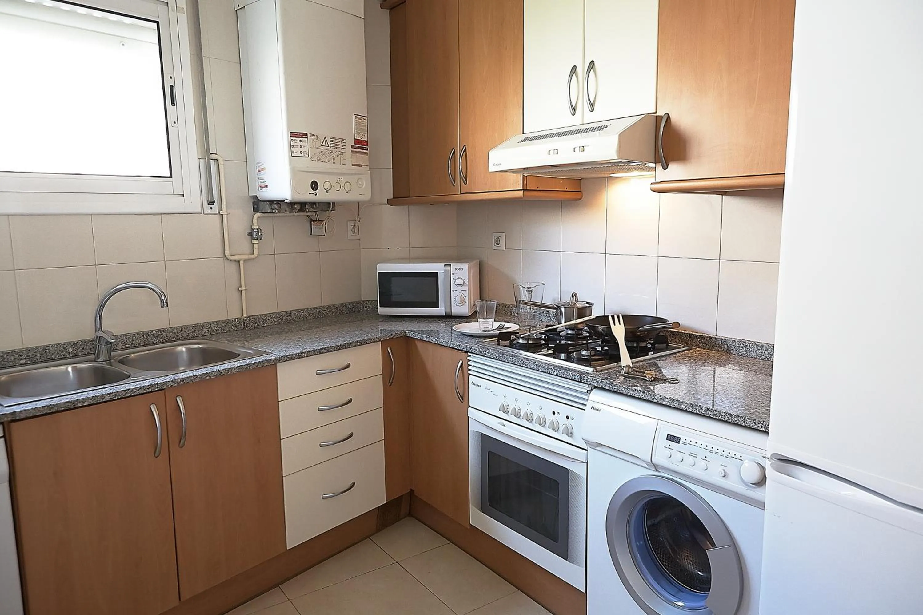 Kitchen or kitchenette in Alguera Apartments Sant Andreu
