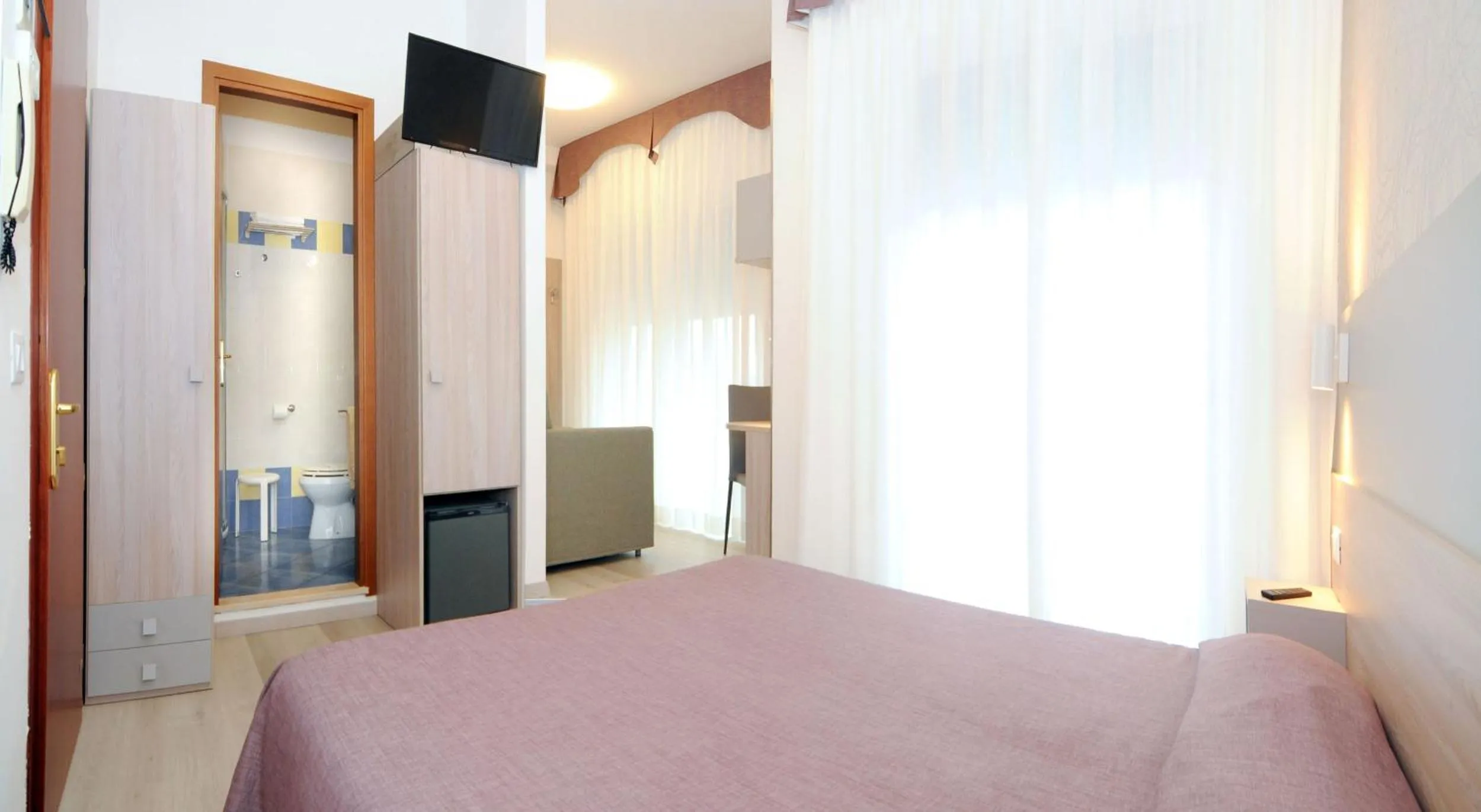 Bed in Hotel Da Mario