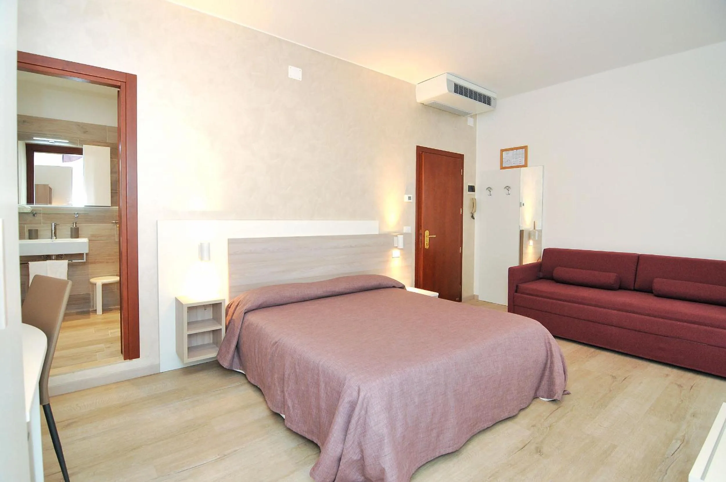 Bed in Hotel Da Mario