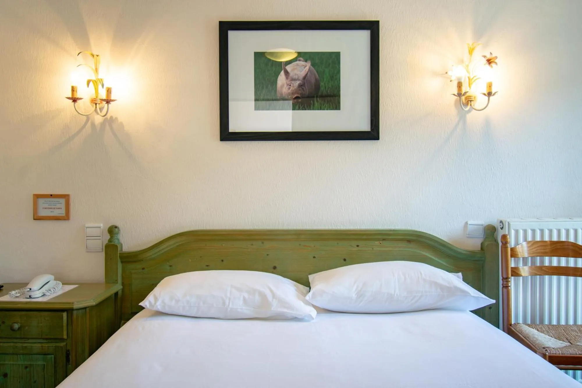 Bed in Hôtel de la Poste