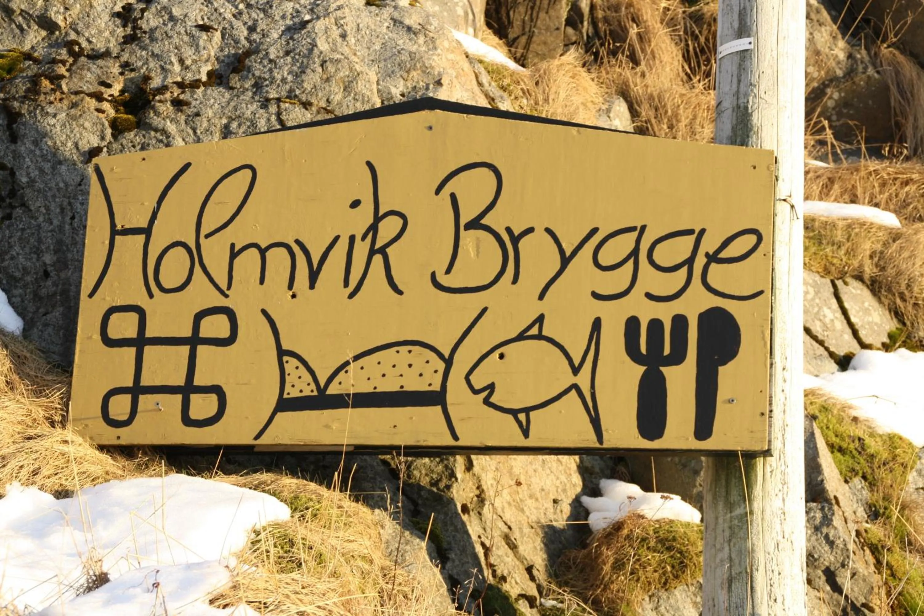 Property logo or sign in Holmvik Brygge Nyksund