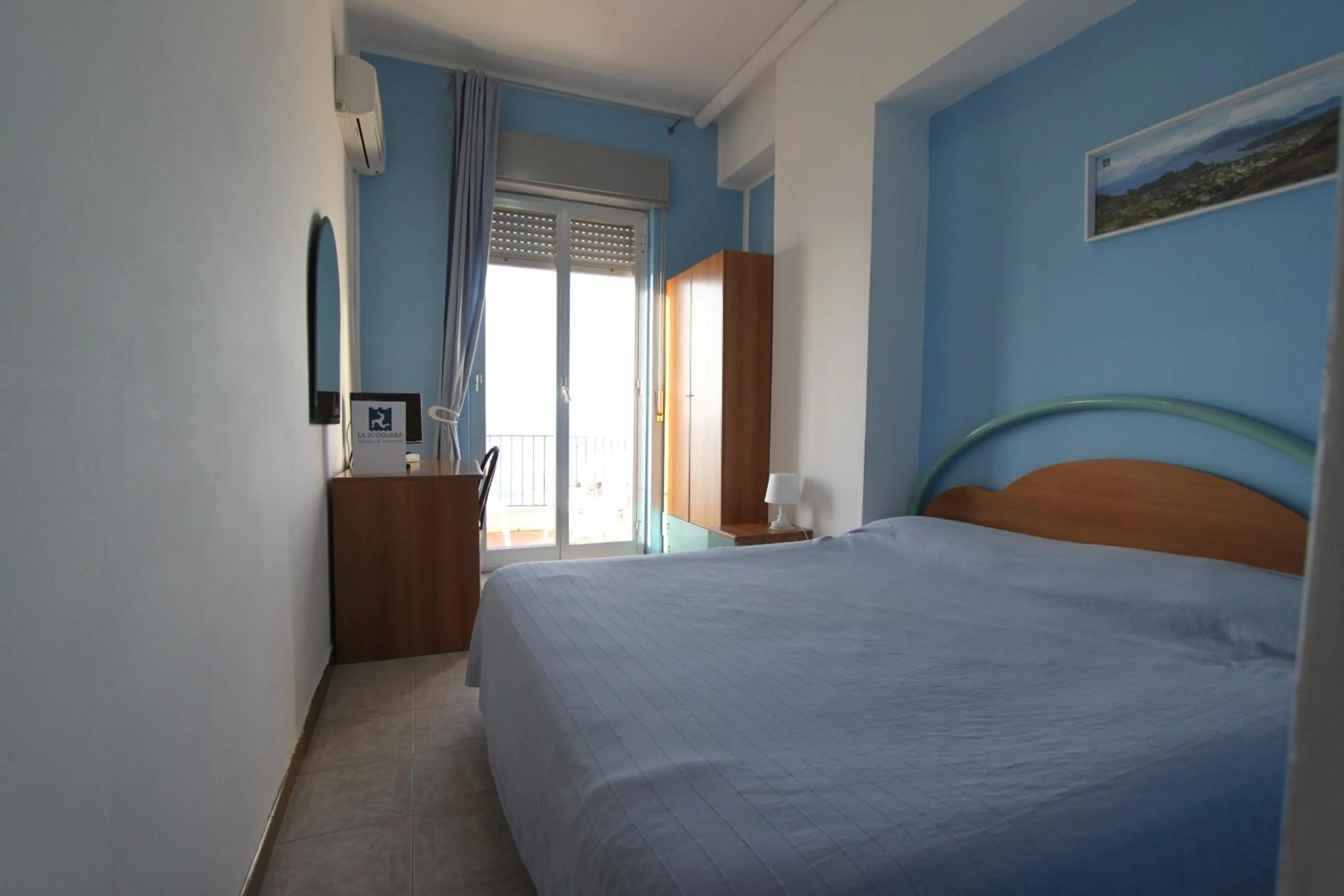 Bedroom in Hotel Ristorante La Scogliera - NUOVA GESTIONE