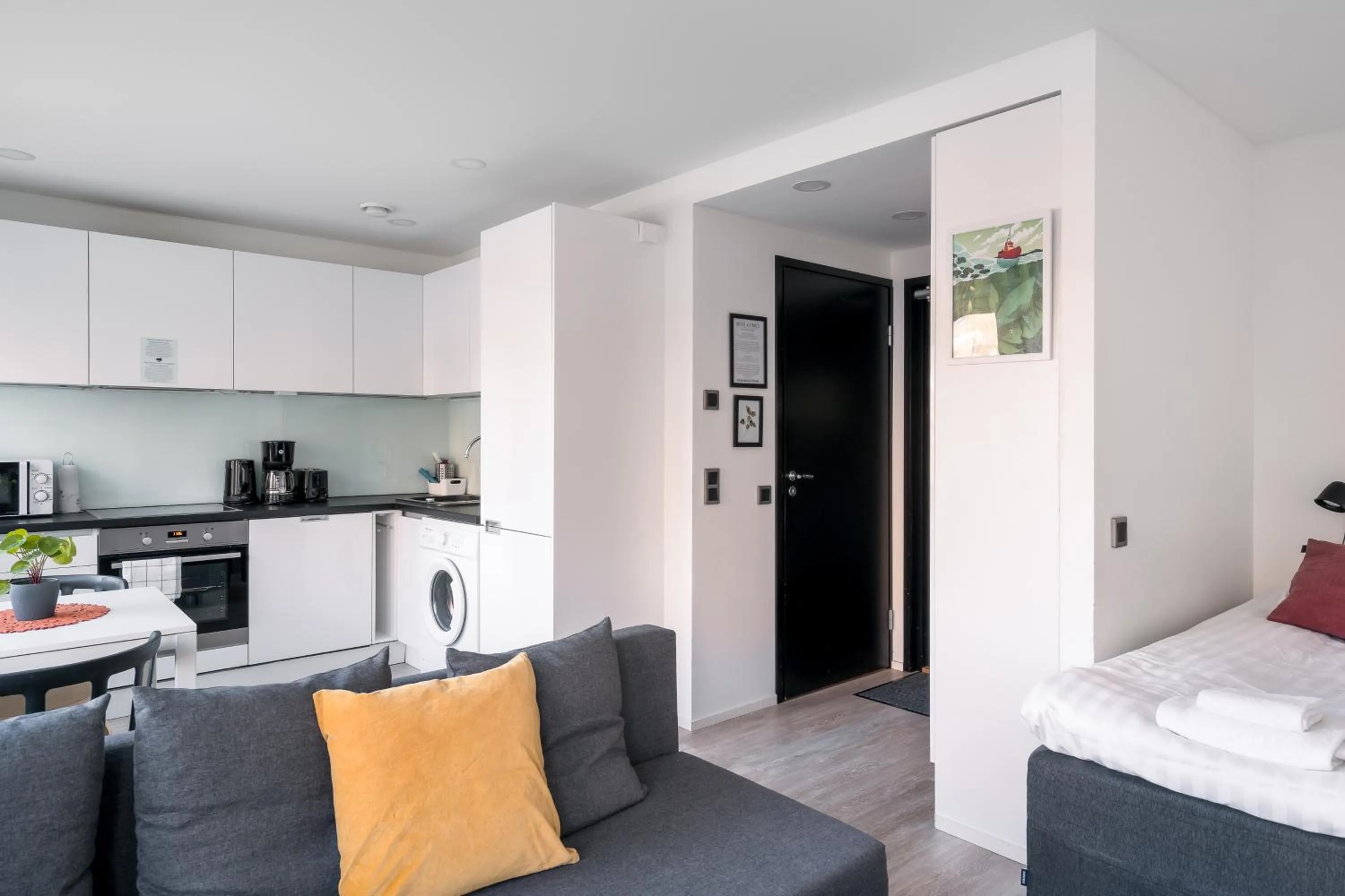 Living room, Bed in Hiisi Homes Helsinki Haaga