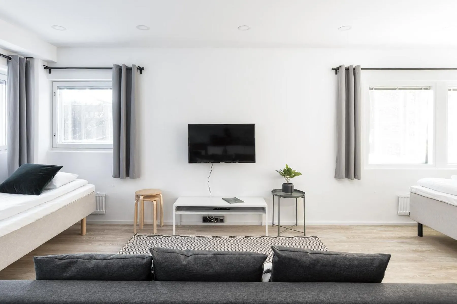 Seating area, Bed in Hiisi Homes Helsinki Haaga