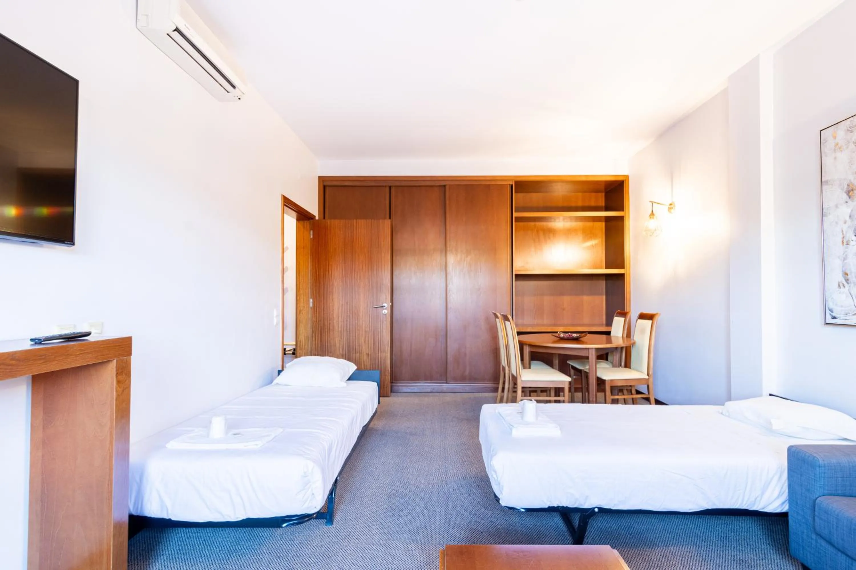 Bed in Hotel La Fontaine